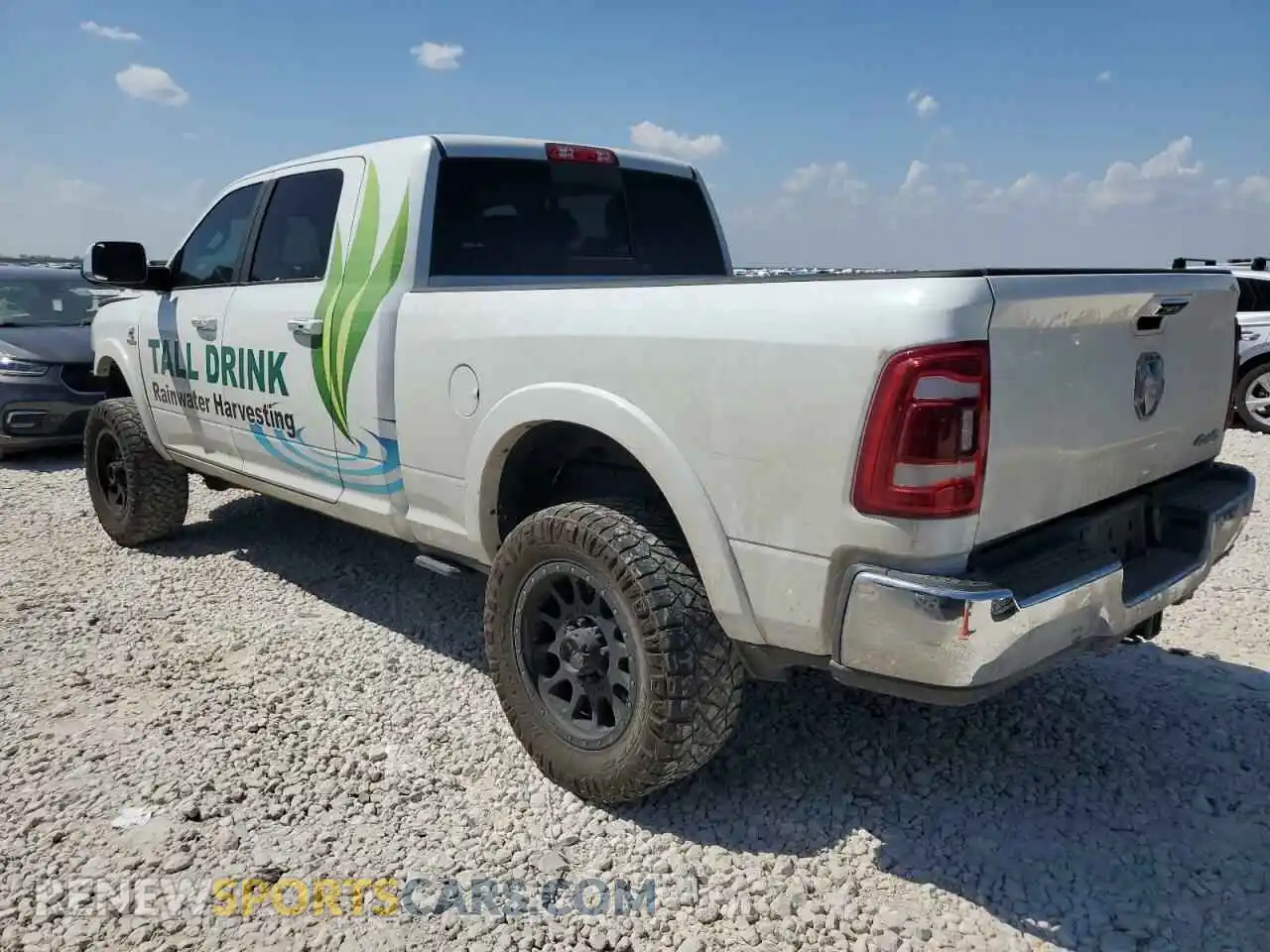 2 Photograph of a damaged car 3C6UR5NL2KG593602 RAM 2500 2019