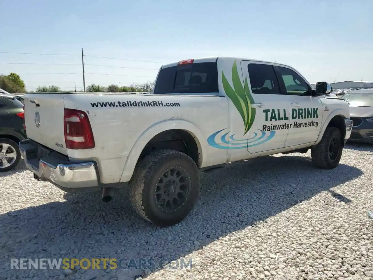 3 Photograph of a damaged car 3C6UR5NL2KG593602 RAM 2500 2019