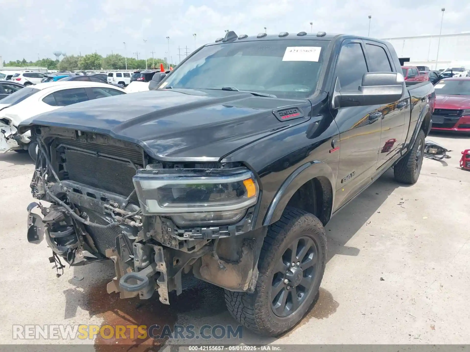2 Photograph of a damaged car 3C6UR5NL7KG530348 RAM 2500 2019