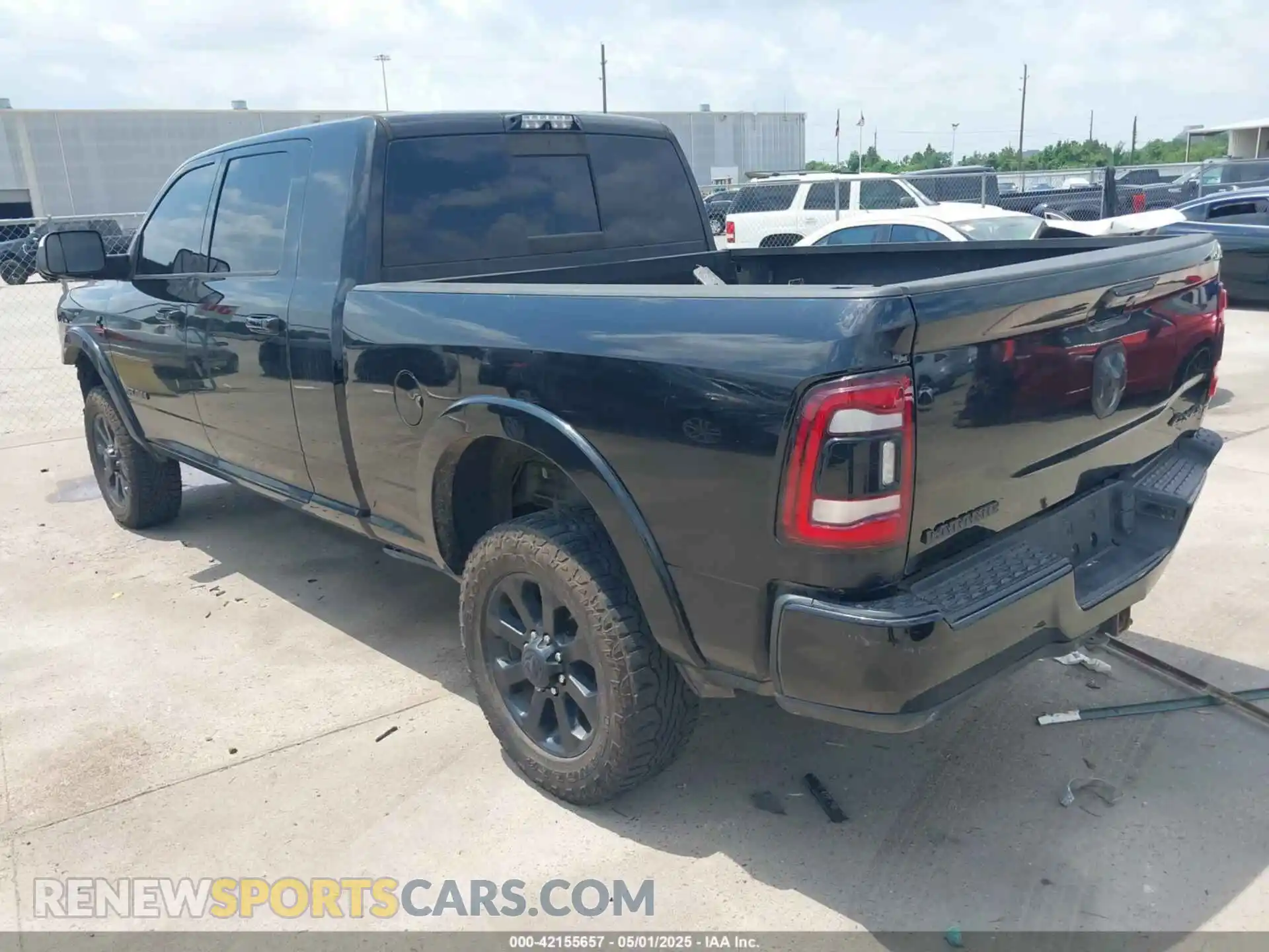 3 Photograph of a damaged car 3C6UR5NL7KG530348 RAM 2500 2019