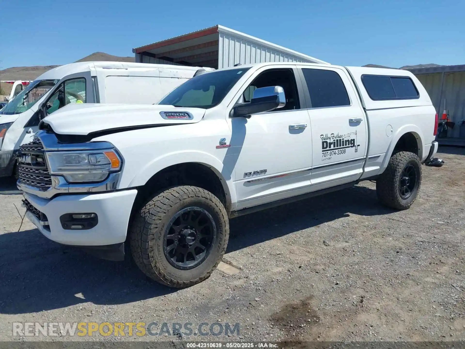 2 Photograph of a damaged car 3C6UR5SL9KG655226 RAM 2500 2019