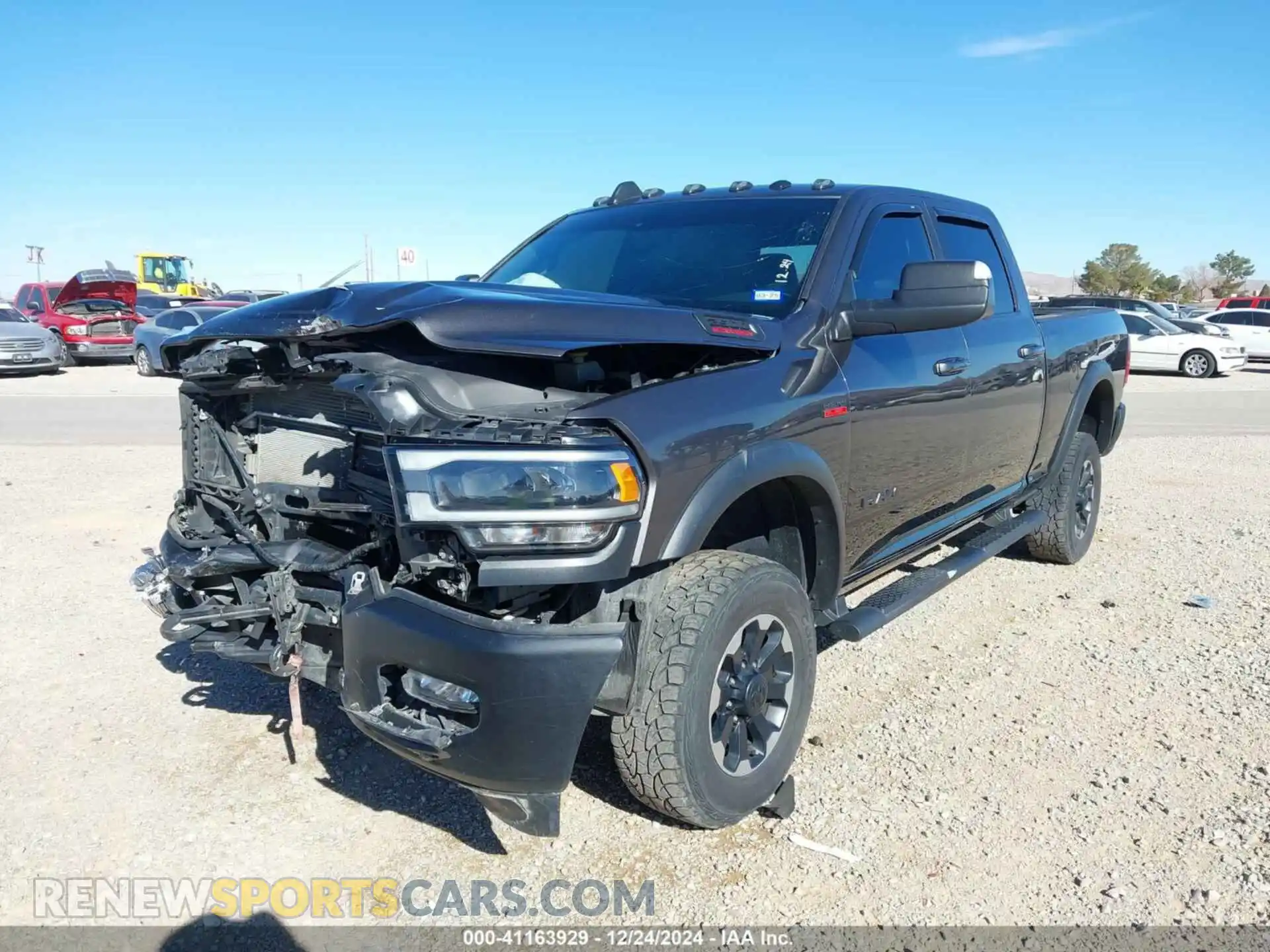 2 Photograph of a damaged car 3C6TR5EJ1LG250193 RAM 2500 2020