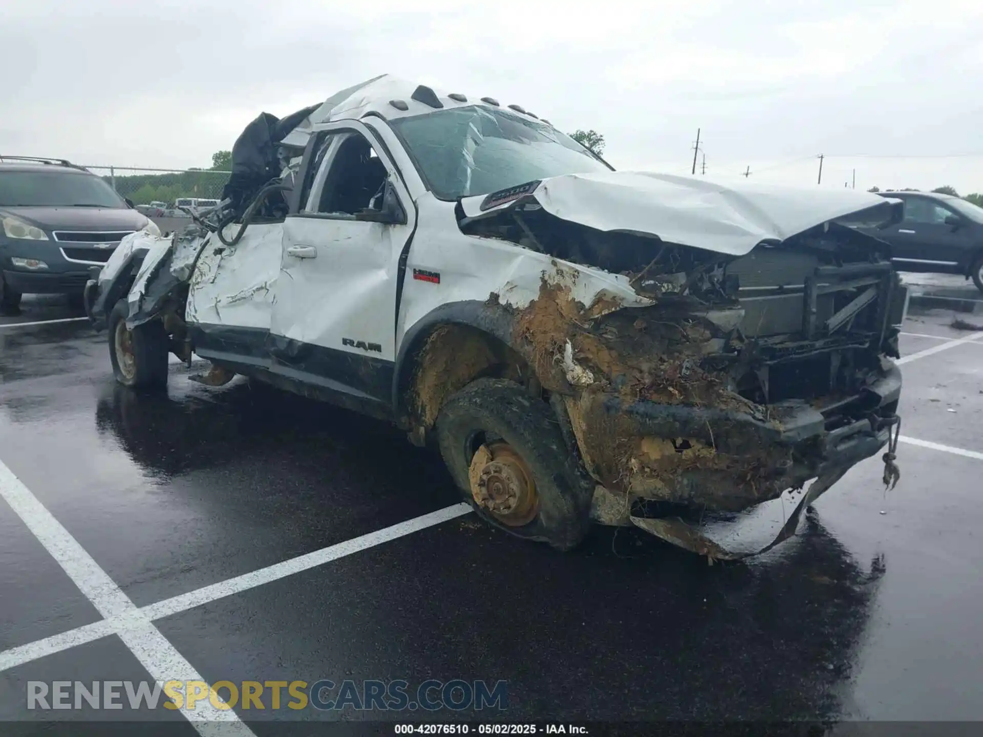 1 Photograph of a damaged car 3C6TR5EJ9LG303402 RAM 2500 2020