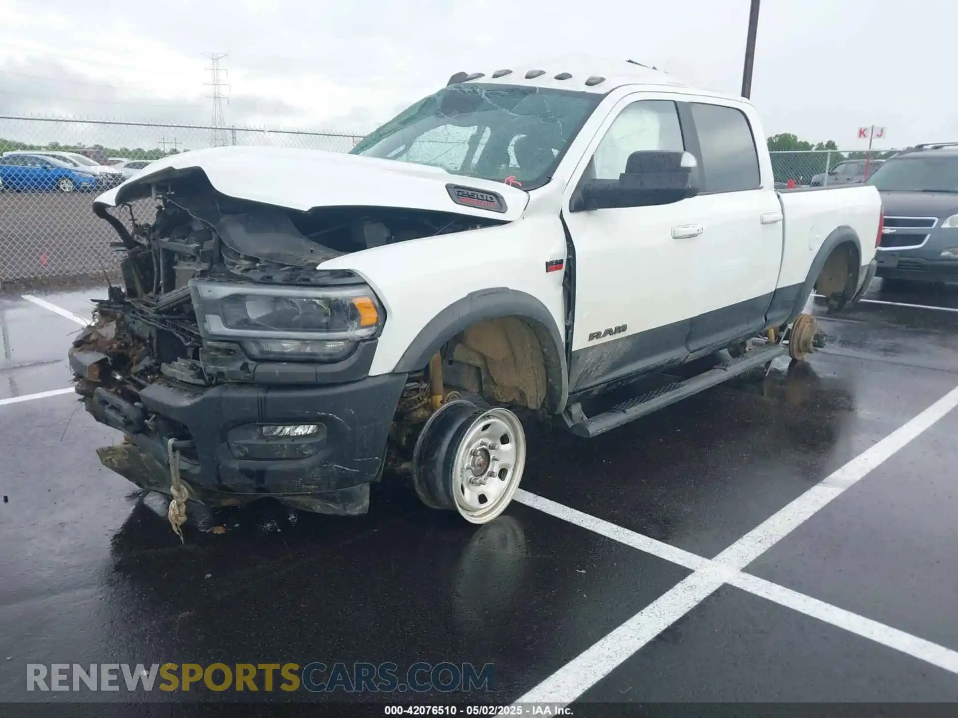 2 Photograph of a damaged car 3C6TR5EJ9LG303402 RAM 2500 2020