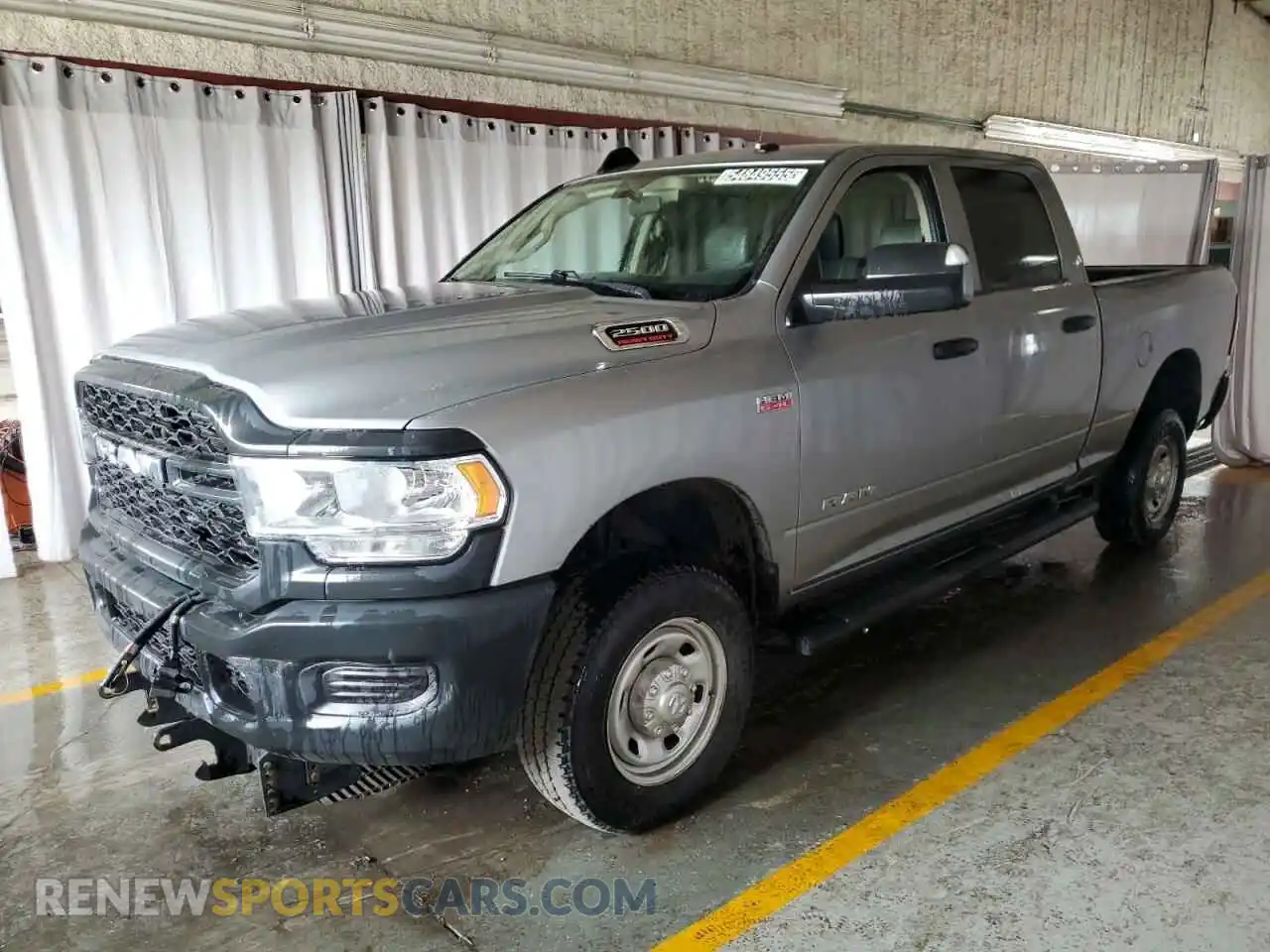 1 Photograph of a damaged car 3C6UR5CJ1LG136332 RAM 2500 2020
