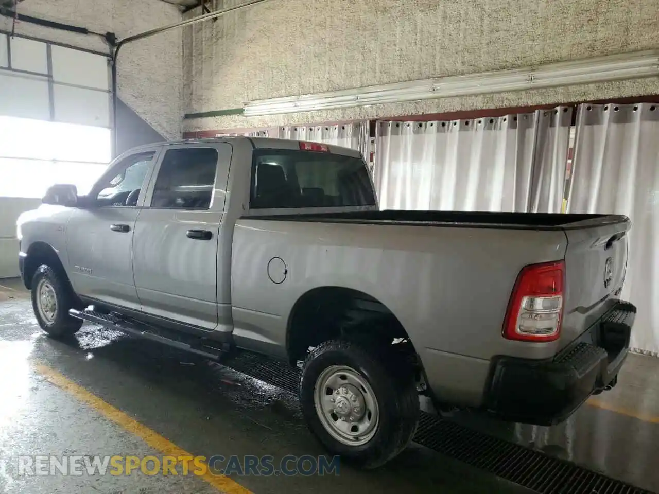 2 Photograph of a damaged car 3C6UR5CJ1LG136332 RAM 2500 2020
