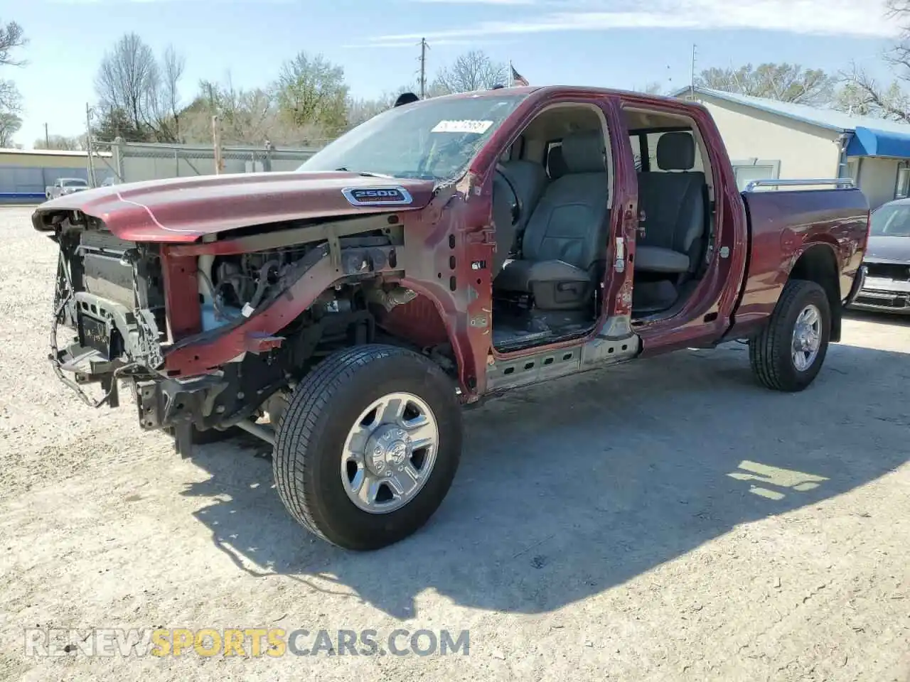 1 Photograph of a damaged car 3C6UR5CJXLG285239 RAM 2500 2020