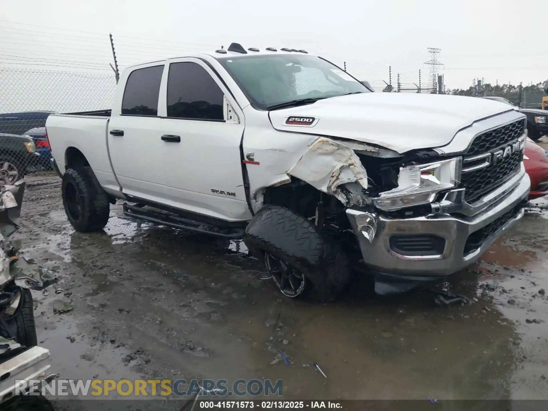 1 Photograph of a damaged car 3C6UR5CL0LG280648 RAM 2500 2020