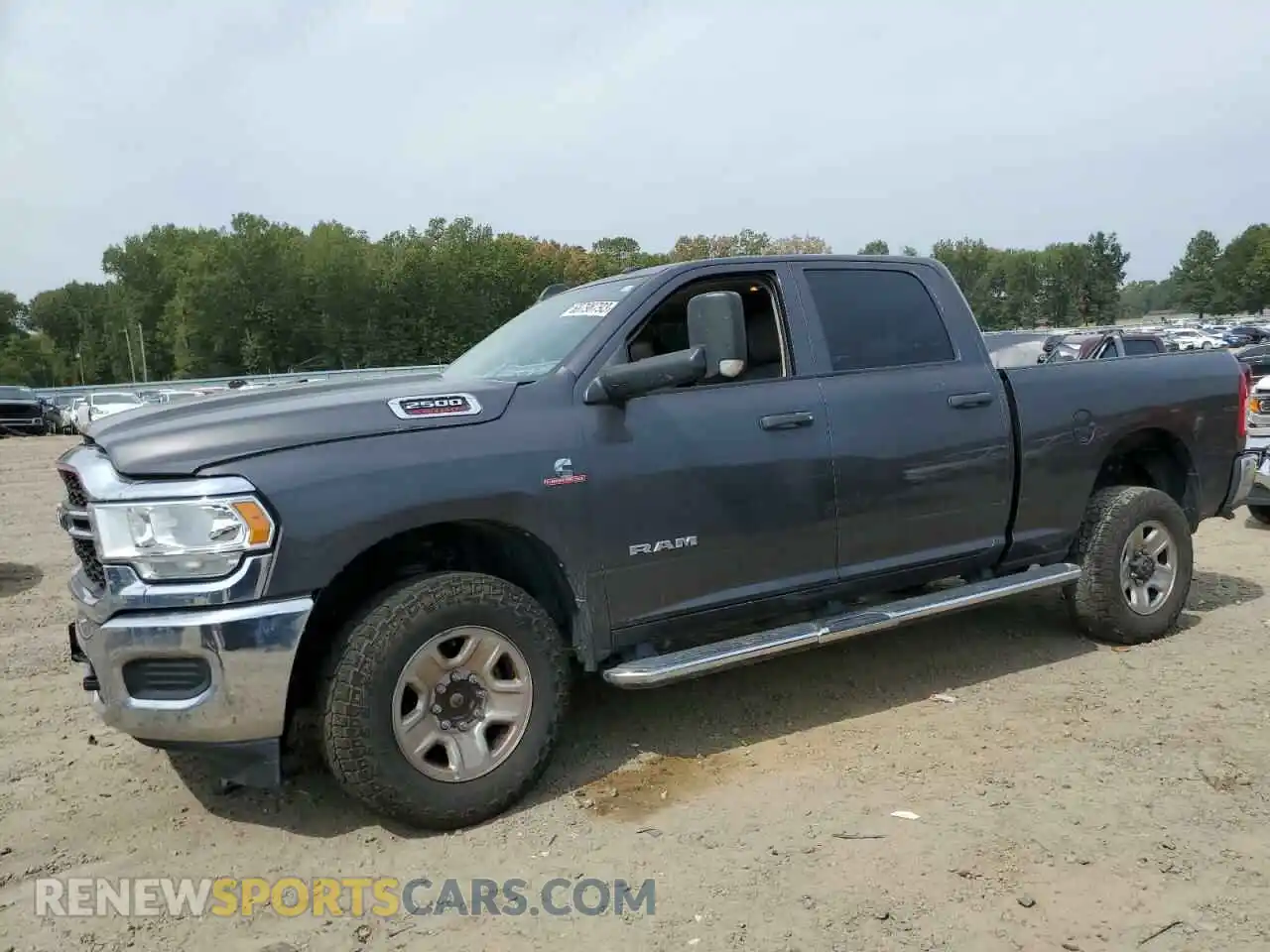 1 Photograph of a damaged car 3C6UR5CL1LG146392 RAM 2500 2020