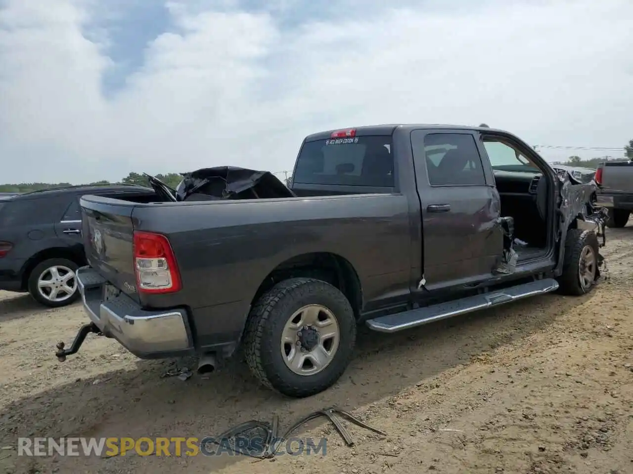 3 Photograph of a damaged car 3C6UR5CL1LG146392 RAM 2500 2020