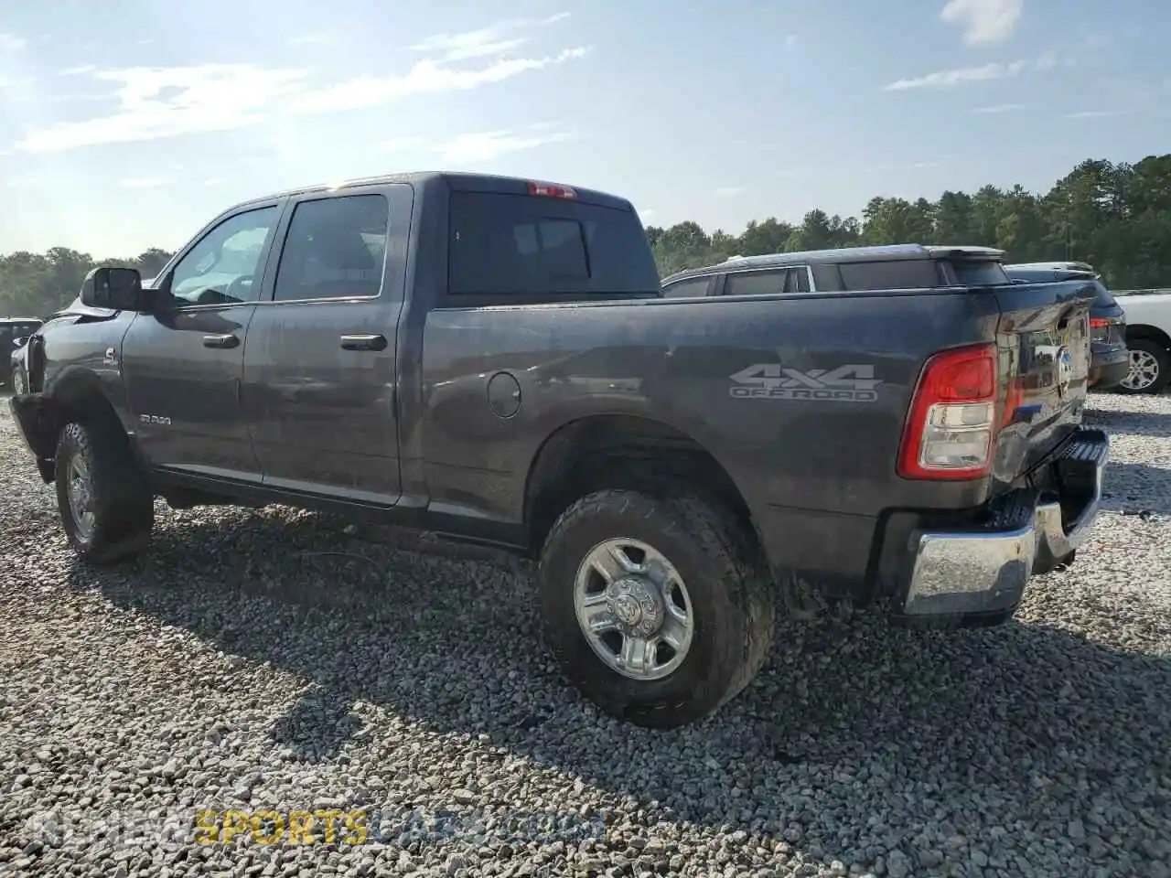 2 Photograph of a damaged car 3C6UR5CL3LG181709 RAM 2500 2020