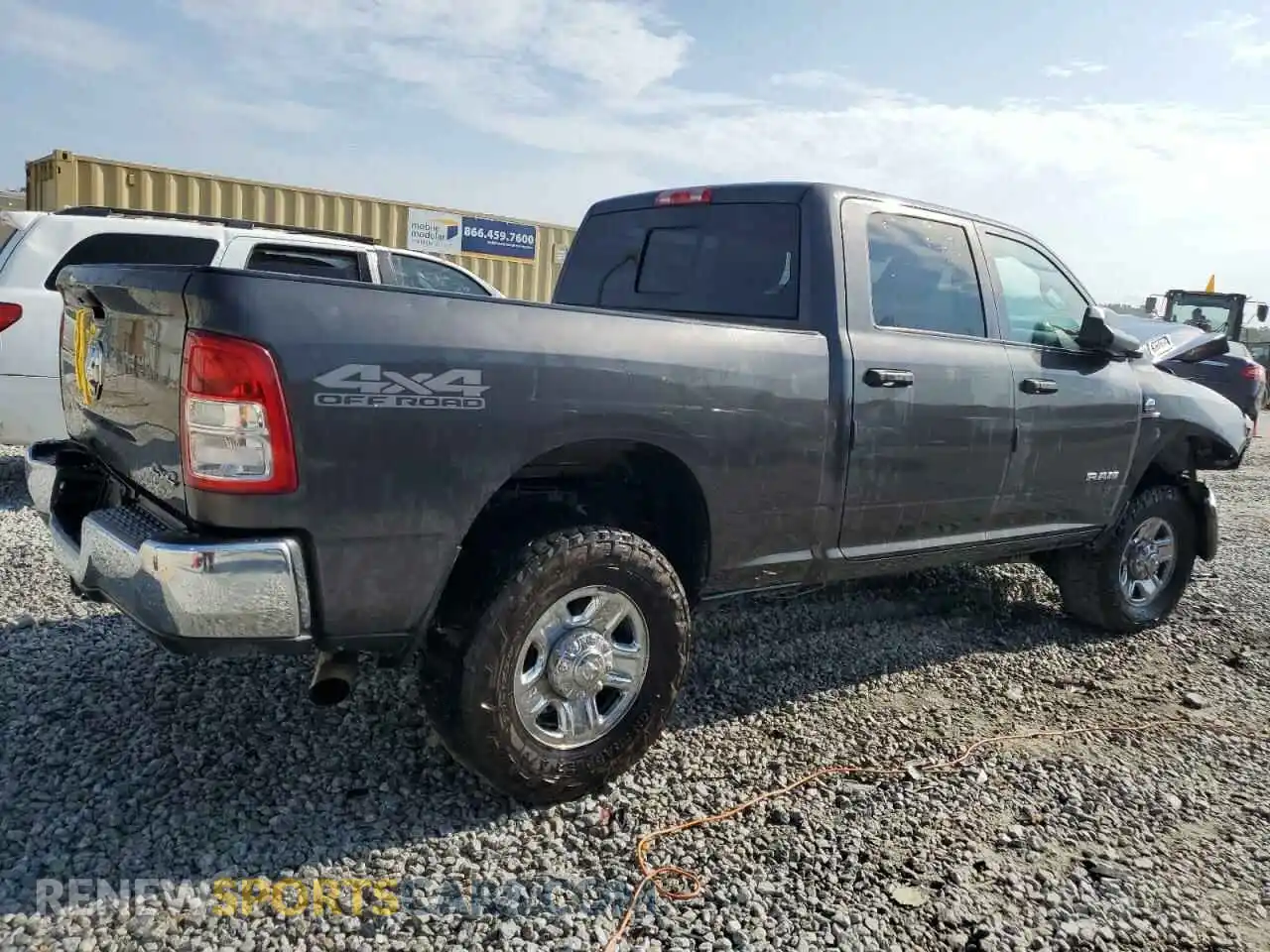 3 Photograph of a damaged car 3C6UR5CL3LG181709 RAM 2500 2020