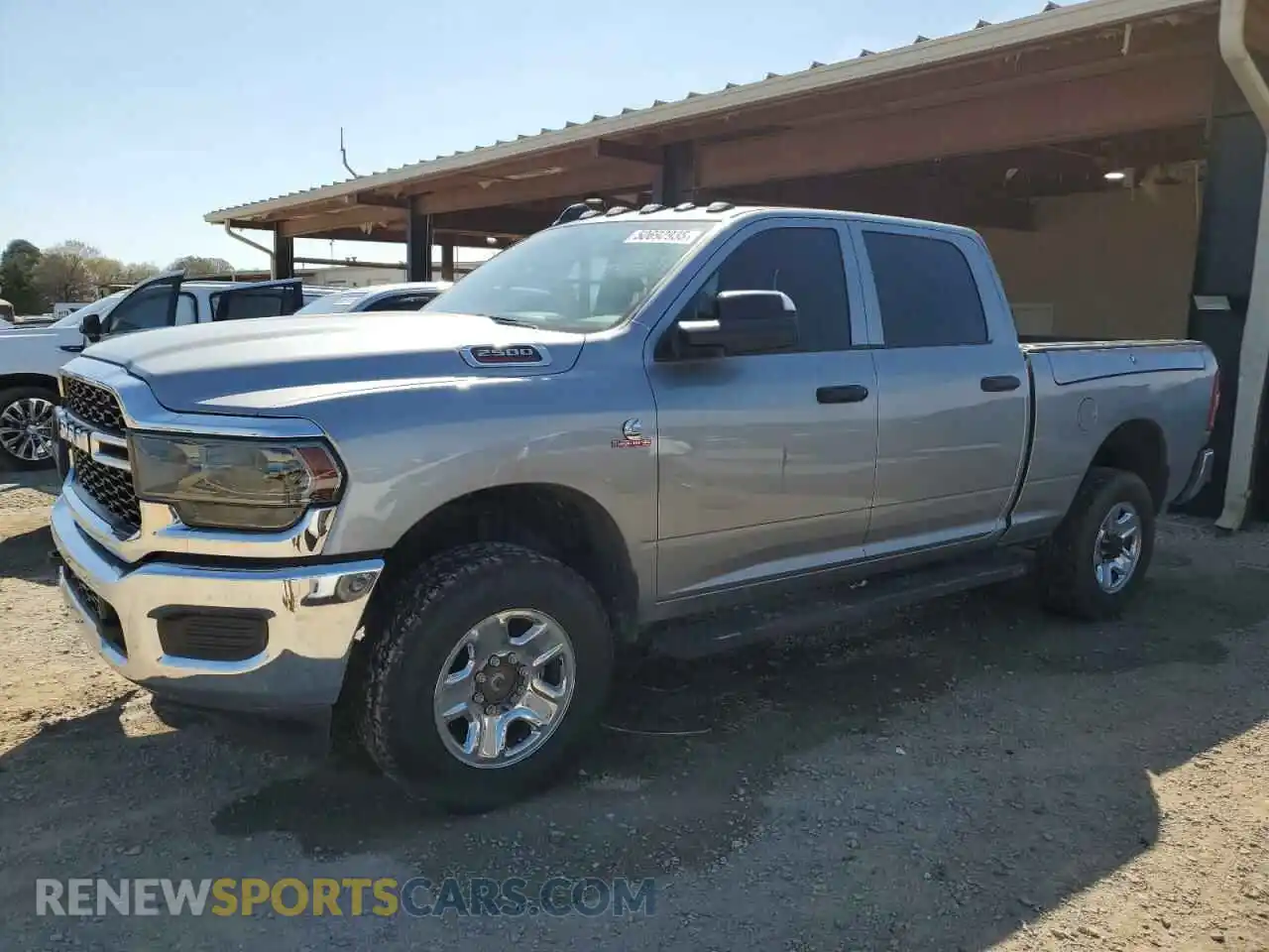 1 Photograph of a damaged car 3C6UR5CL7LG145991 RAM 2500 2020