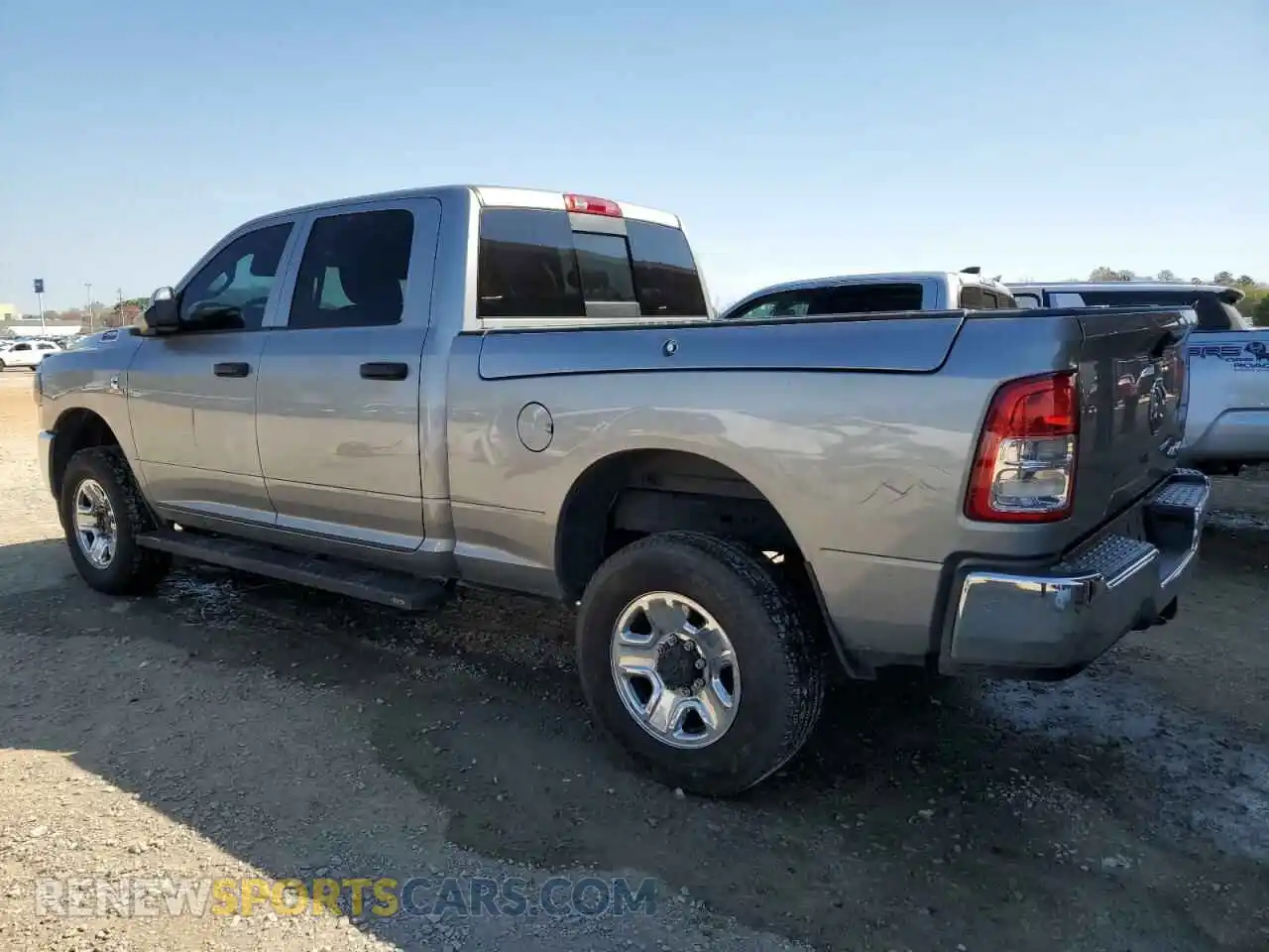 2 Photograph of a damaged car 3C6UR5CL7LG145991 RAM 2500 2020