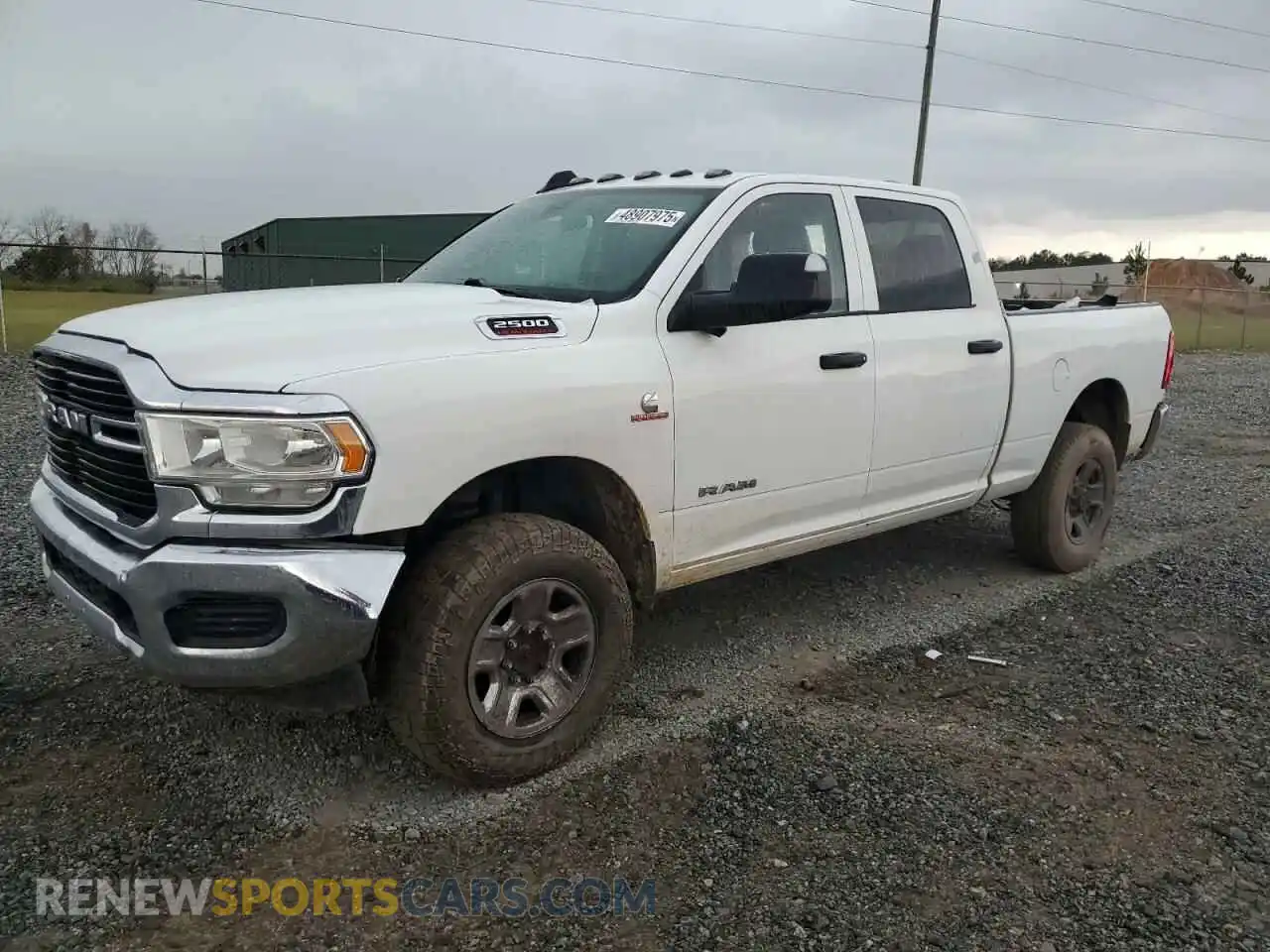 1 Photograph of a damaged car 3C6UR5CL9LG111003 RAM 2500 2020