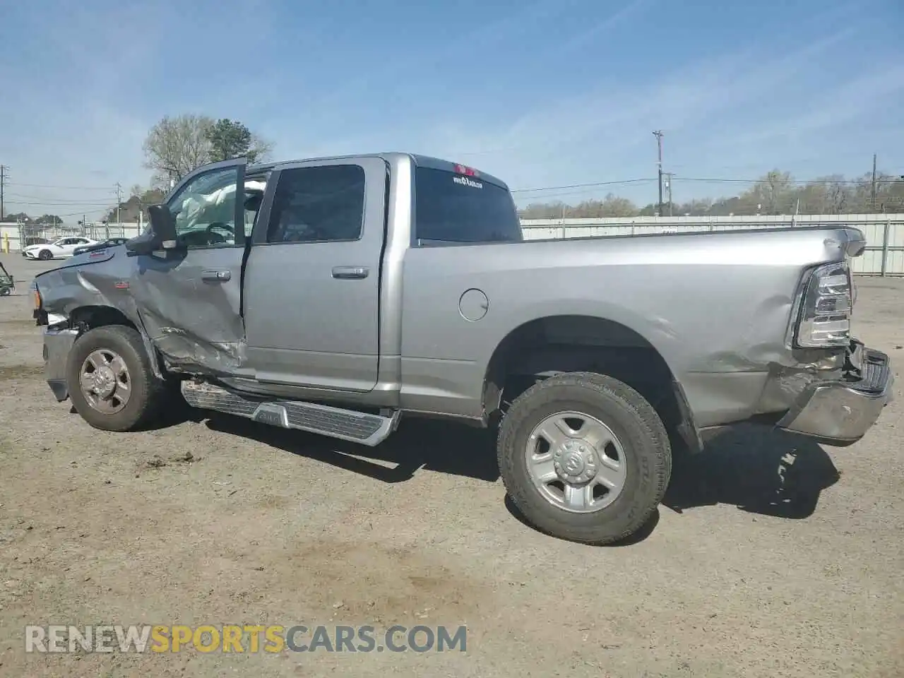 2 Photograph of a damaged car 3C6UR5DJ2LG297531 RAM 2500 2020