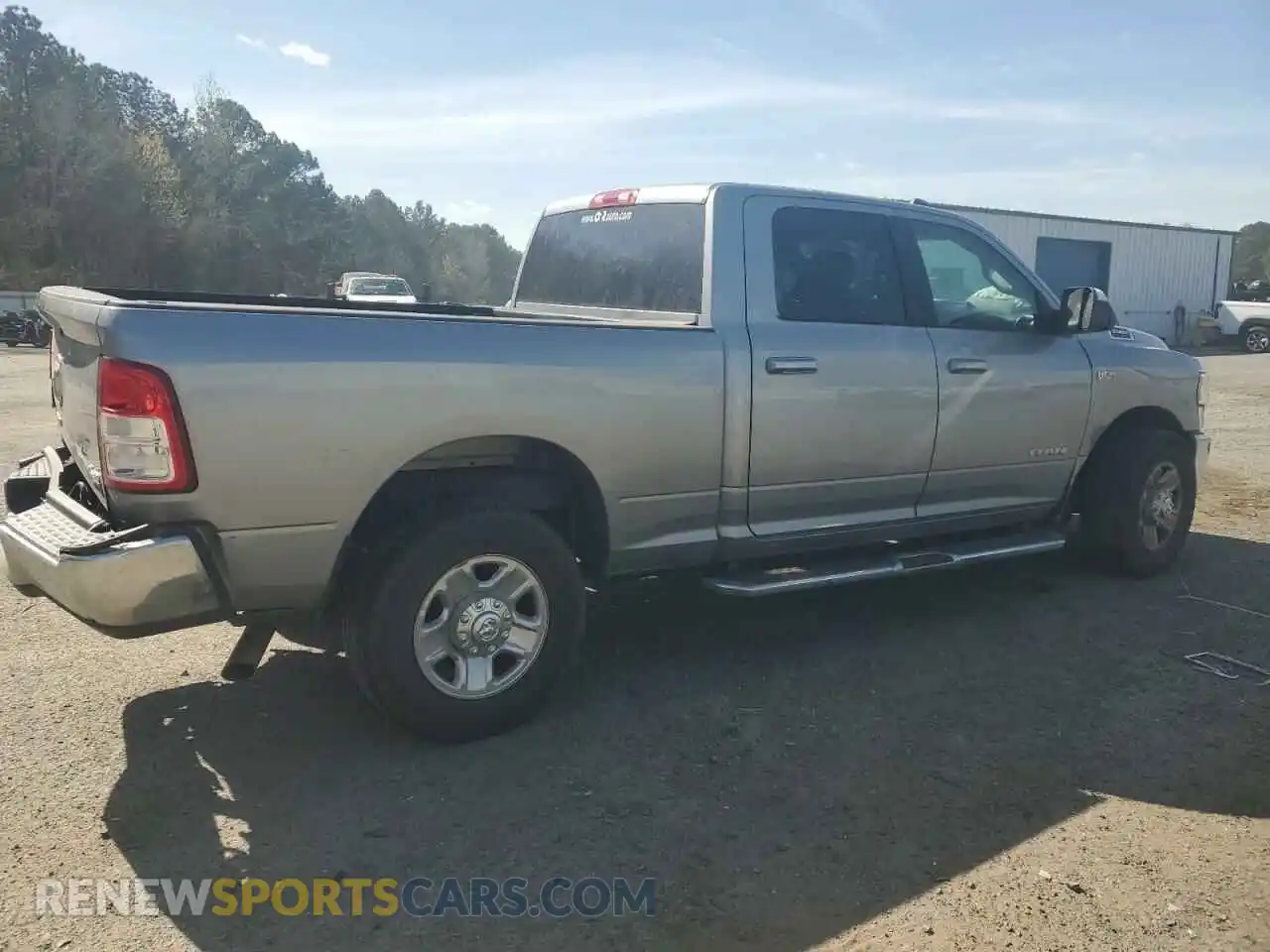 3 Photograph of a damaged car 3C6UR5DJ2LG297531 RAM 2500 2020