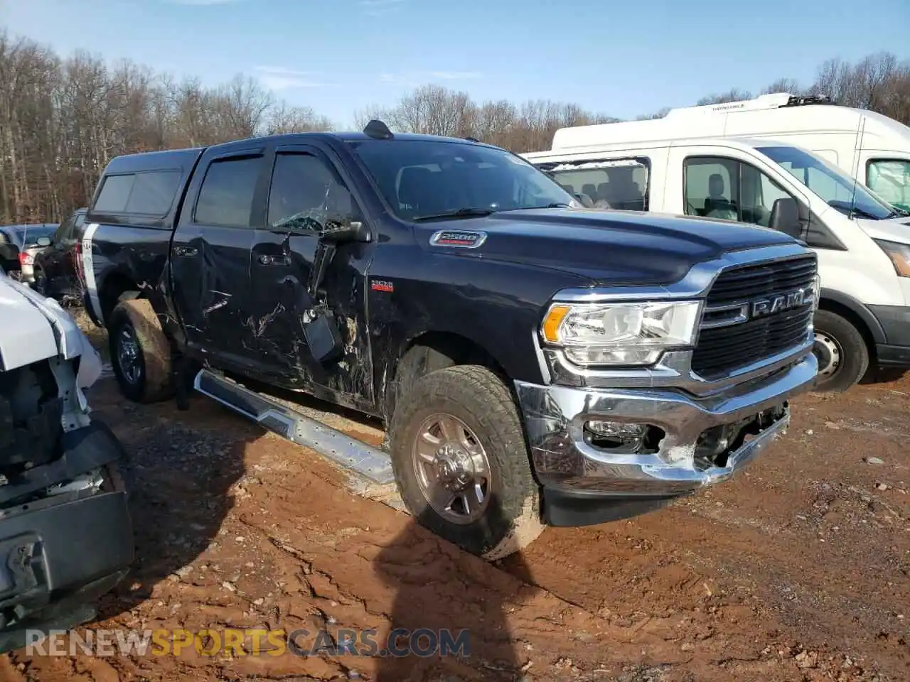 1 Photograph of a damaged car 3C6UR5DJ3LG139859 RAM 2500 2020