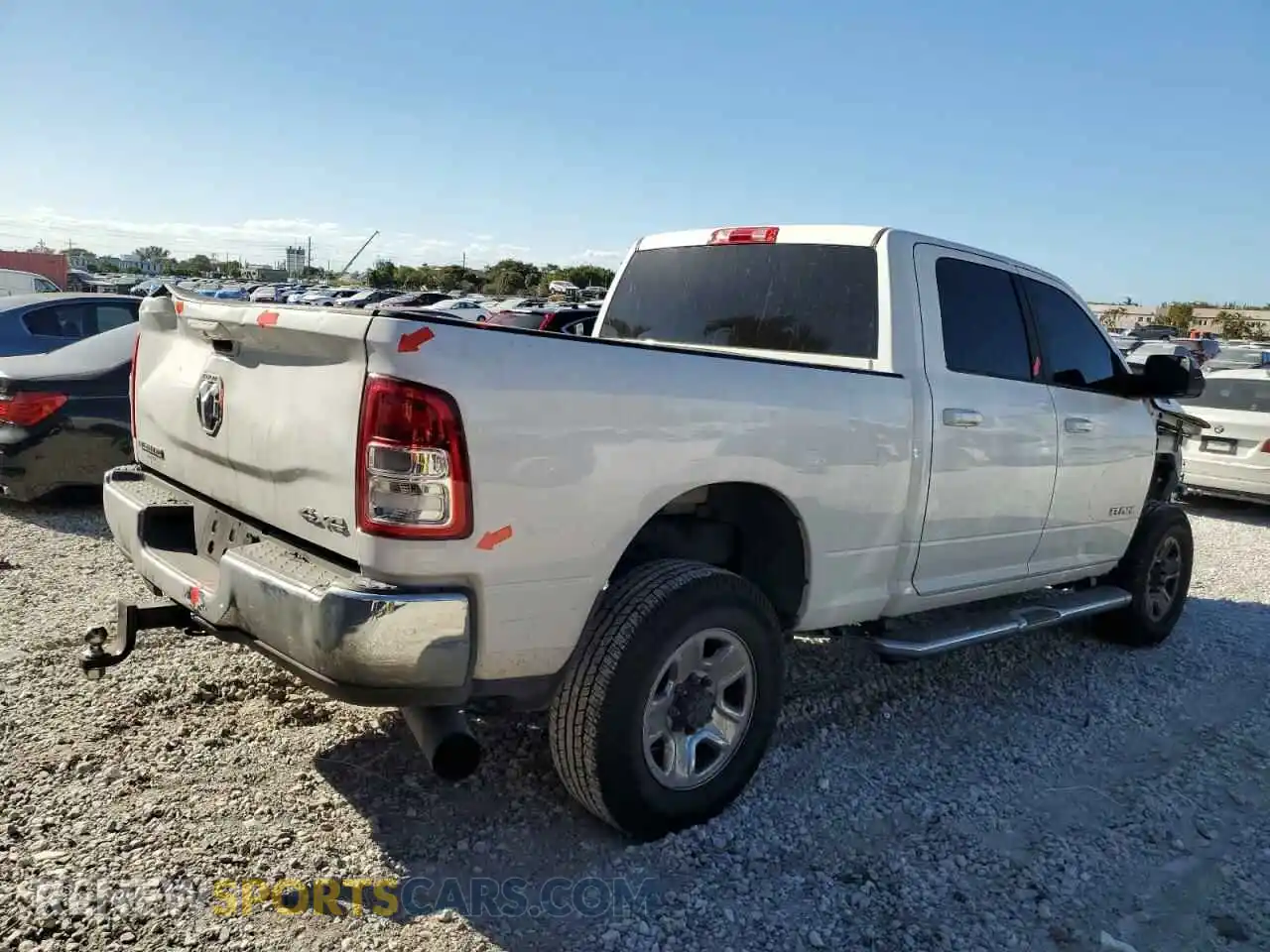 3 Photograph of a damaged car 3C6UR5DL0LG132708 RAM 2500 2020