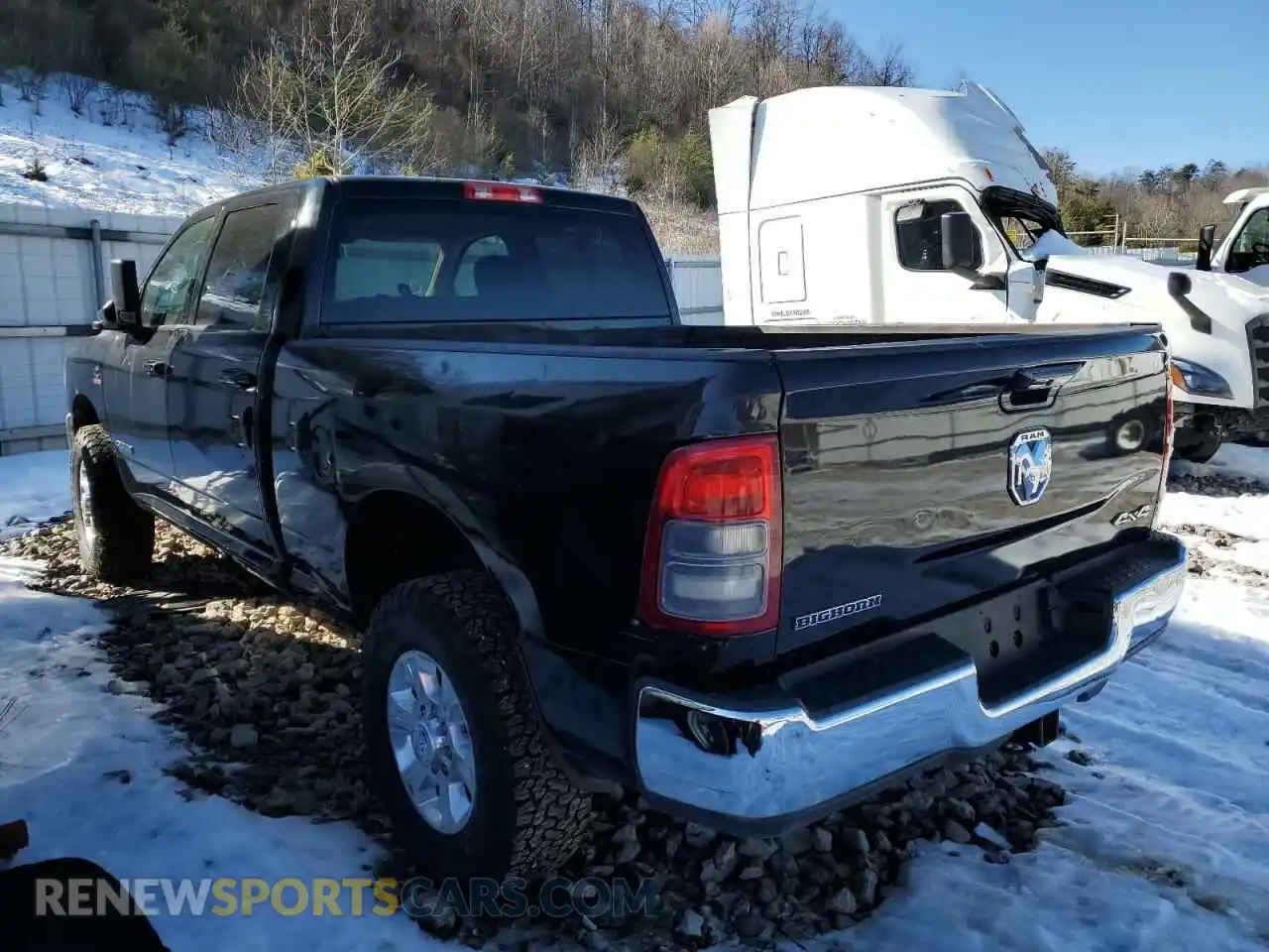 2 Photograph of a damaged car 3C6UR5DL1LG116386 RAM 2500 2020