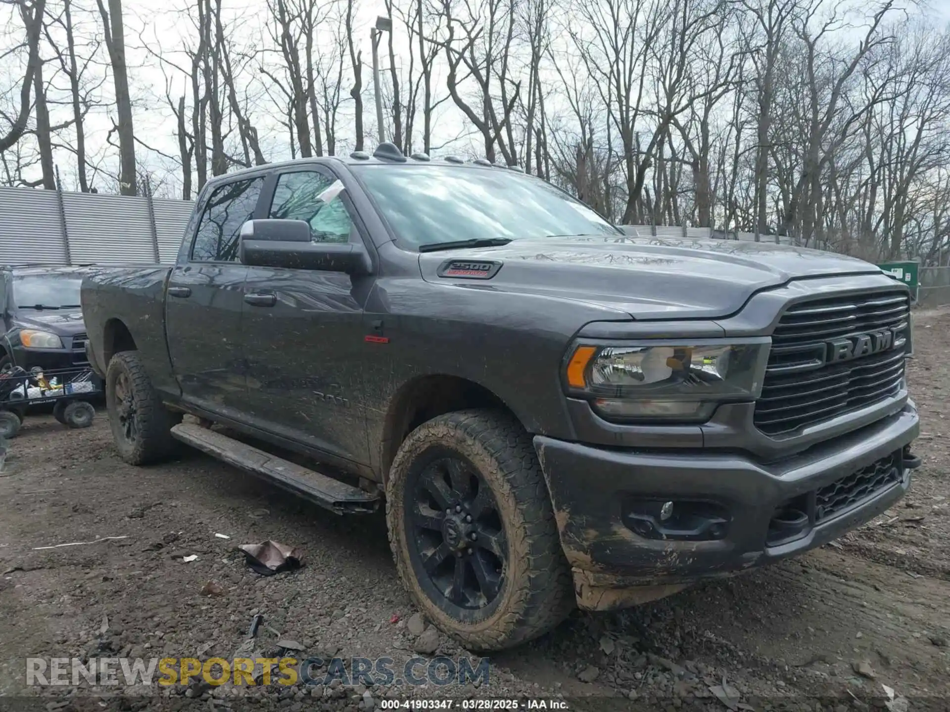 1 Photograph of a damaged car 3C6UR5DL1LG261444 RAM 2500 2020