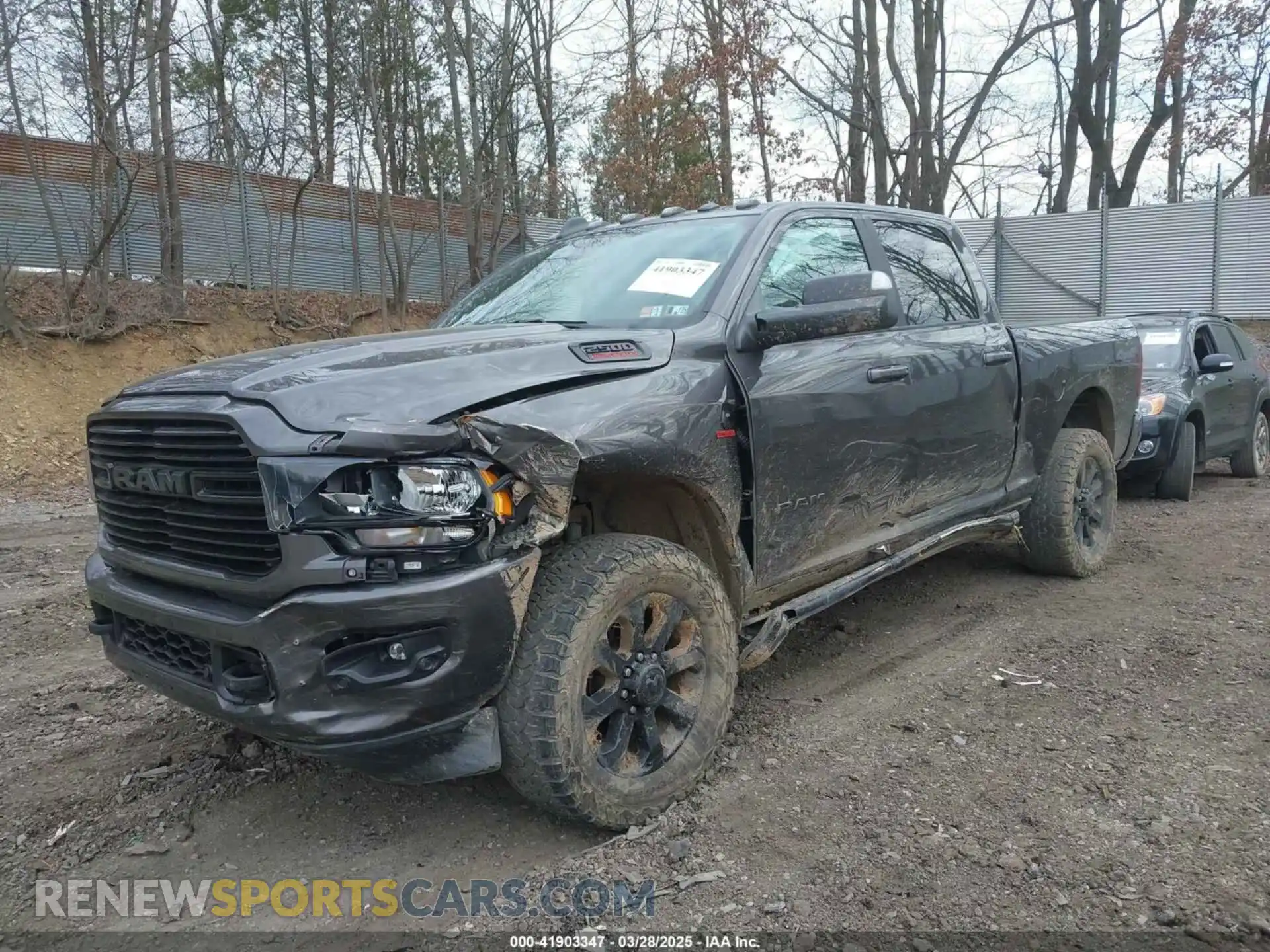 2 Photograph of a damaged car 3C6UR5DL1LG261444 RAM 2500 2020