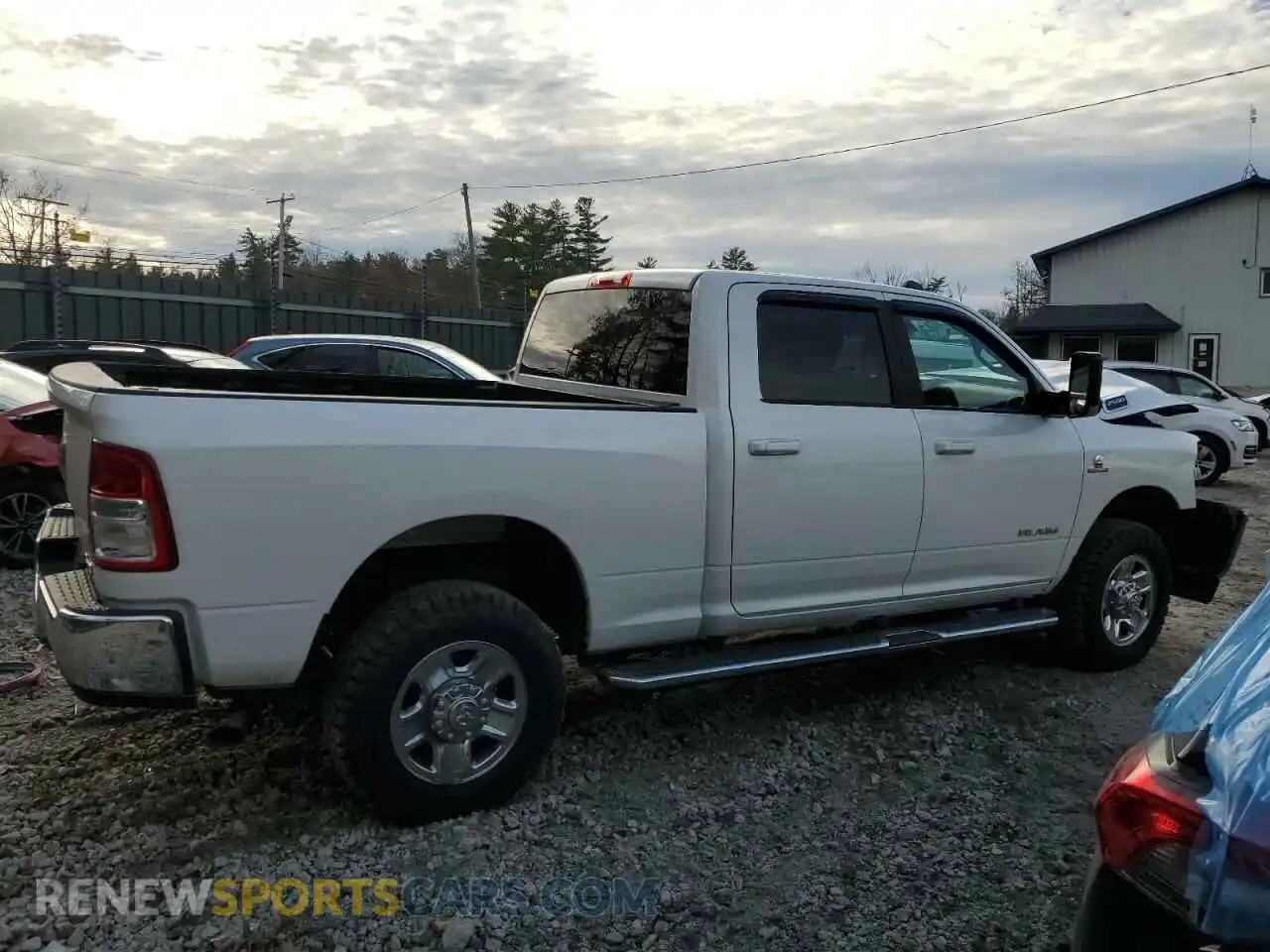 3 Photograph of a damaged car 3C6UR5DL2LG116977 RAM 2500 2020