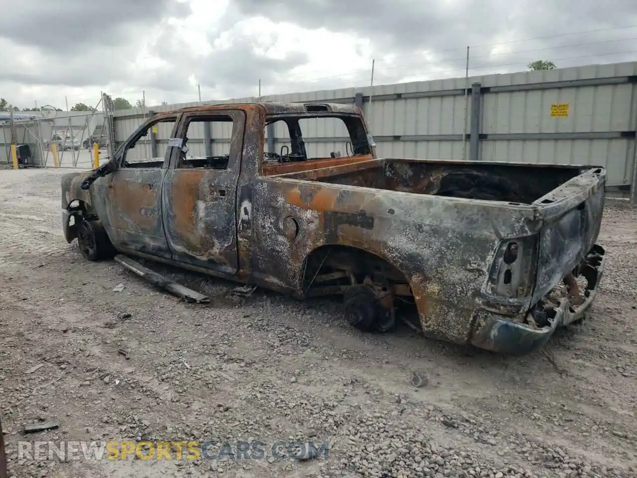 2 Photograph of a damaged car 3C6UR5DL3LG119077 RAM 2500 2020