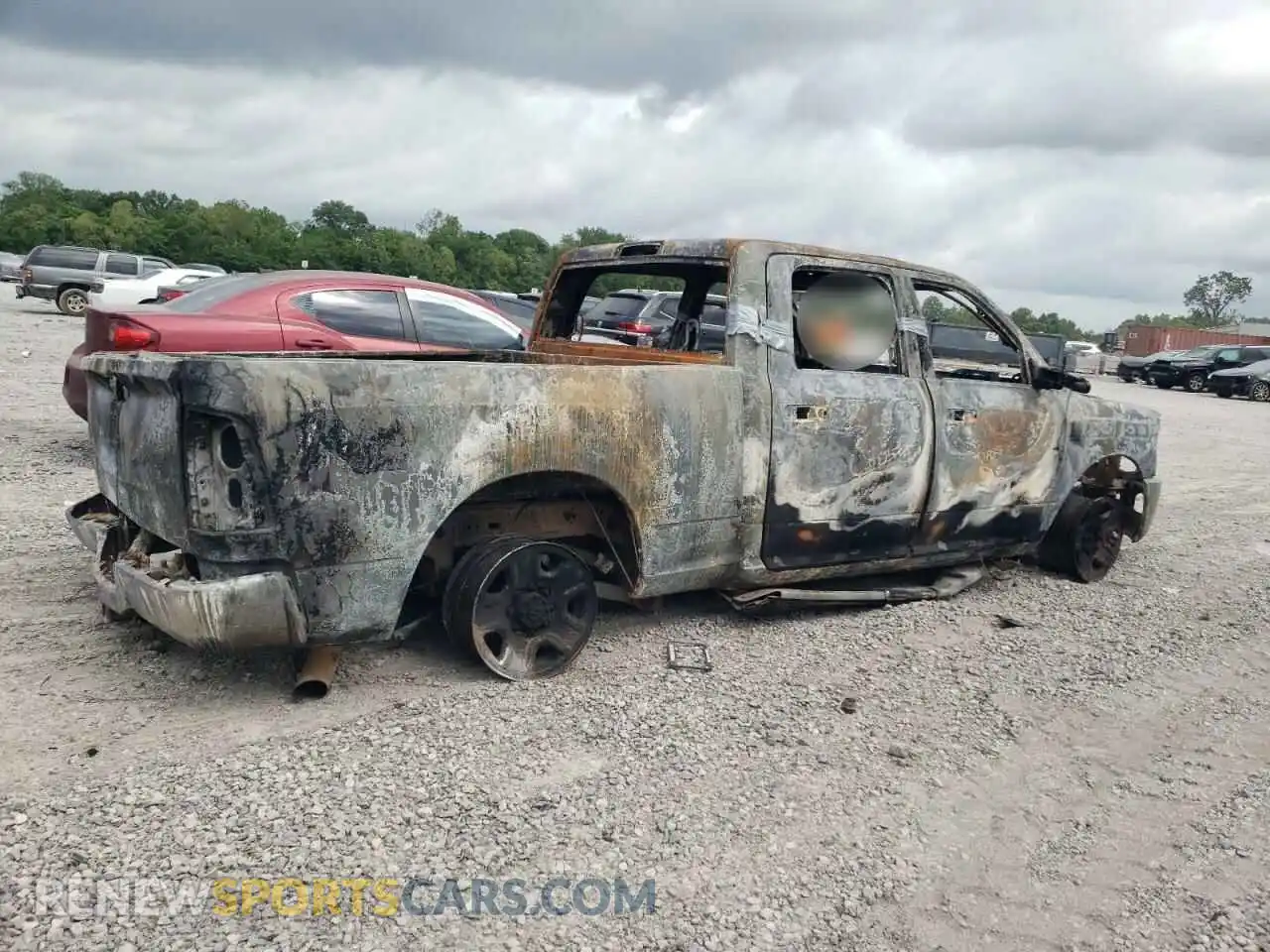 3 Photograph of a damaged car 3C6UR5DL3LG119077 RAM 2500 2020