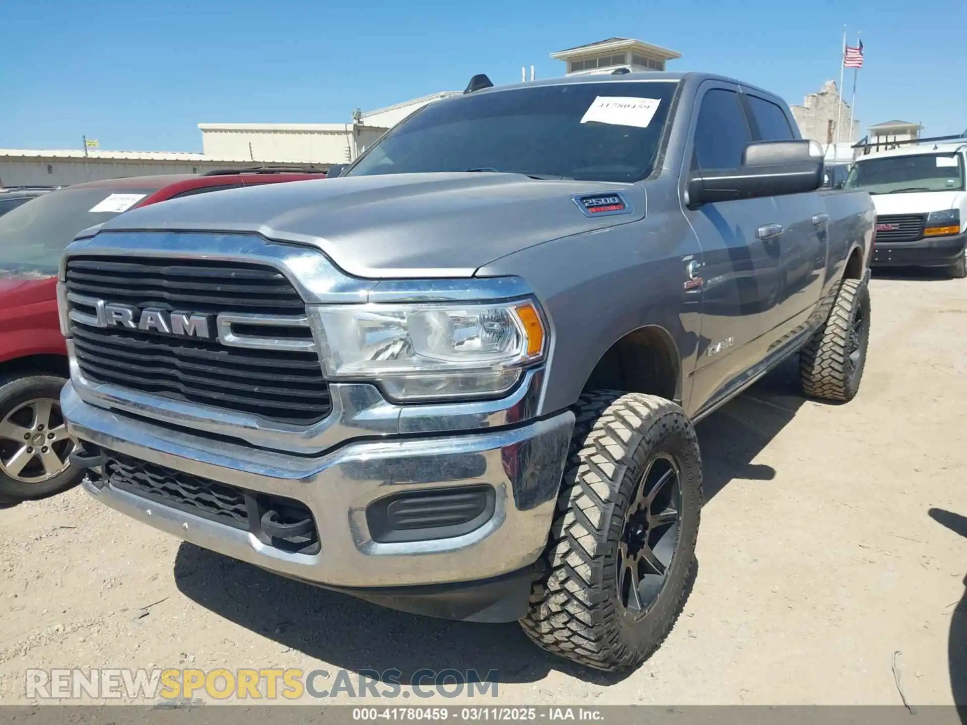 2 Photograph of a damaged car 3C6UR5DL3LG141225 RAM 2500 2020