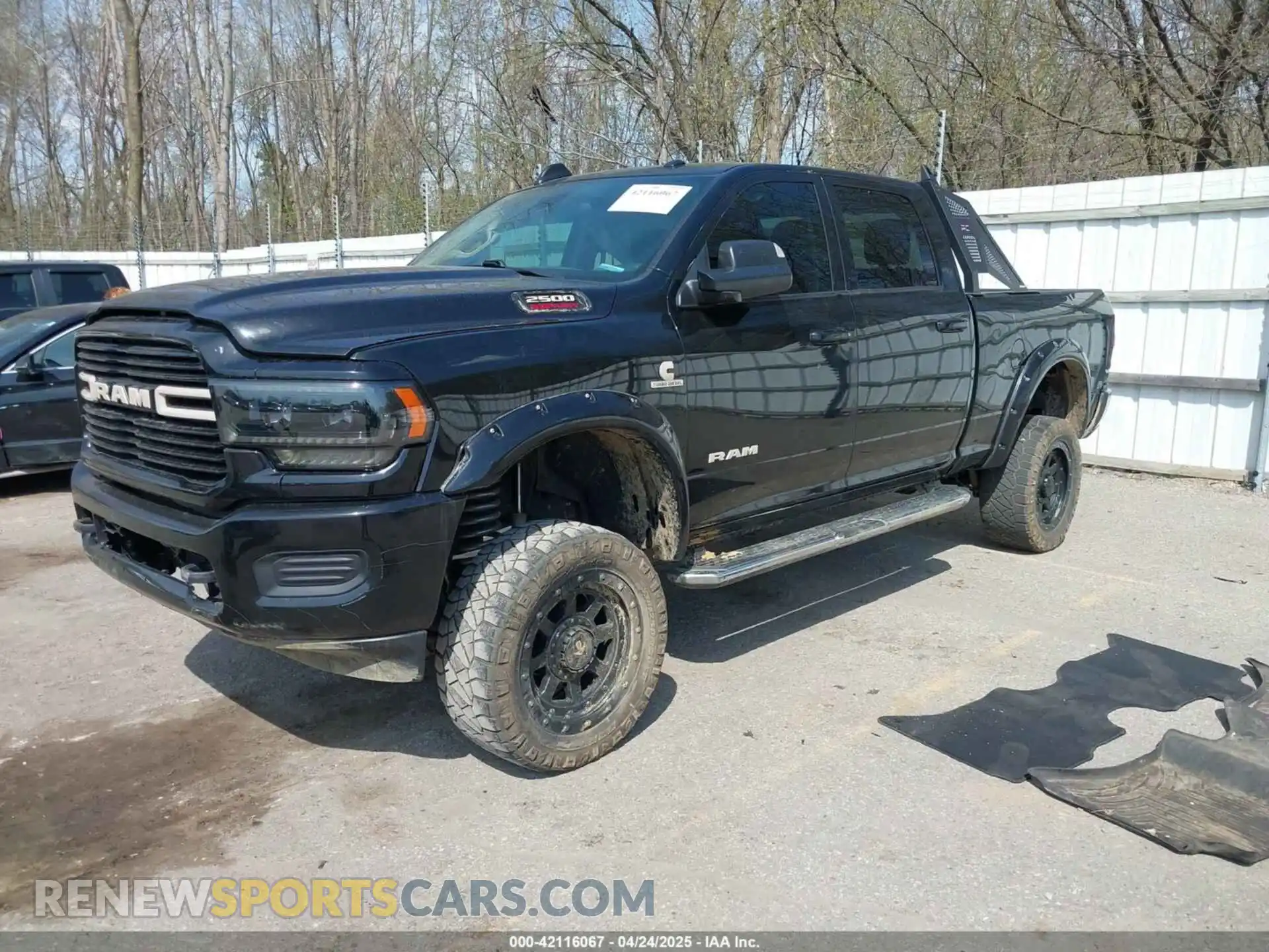 2 Photograph of a damaged car 3C6UR5DL6LG116741 RAM 2500 2020