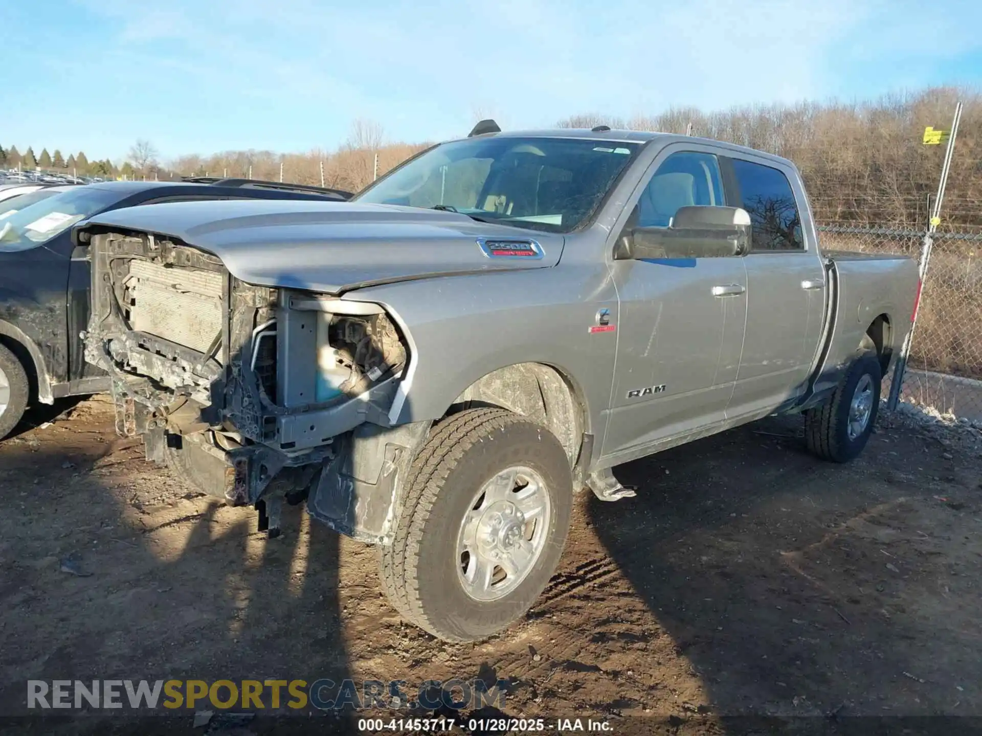 2 Photograph of a damaged car 3C6UR5DL6LG159816 RAM 2500 2020