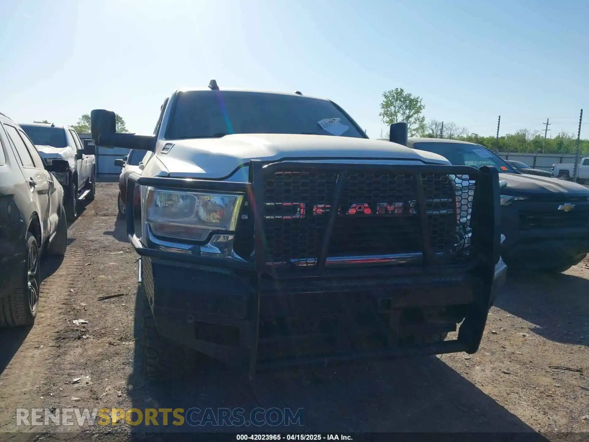 1 Photograph of a damaged car 3C6UR5DL7LG160263 RAM 2500 2020