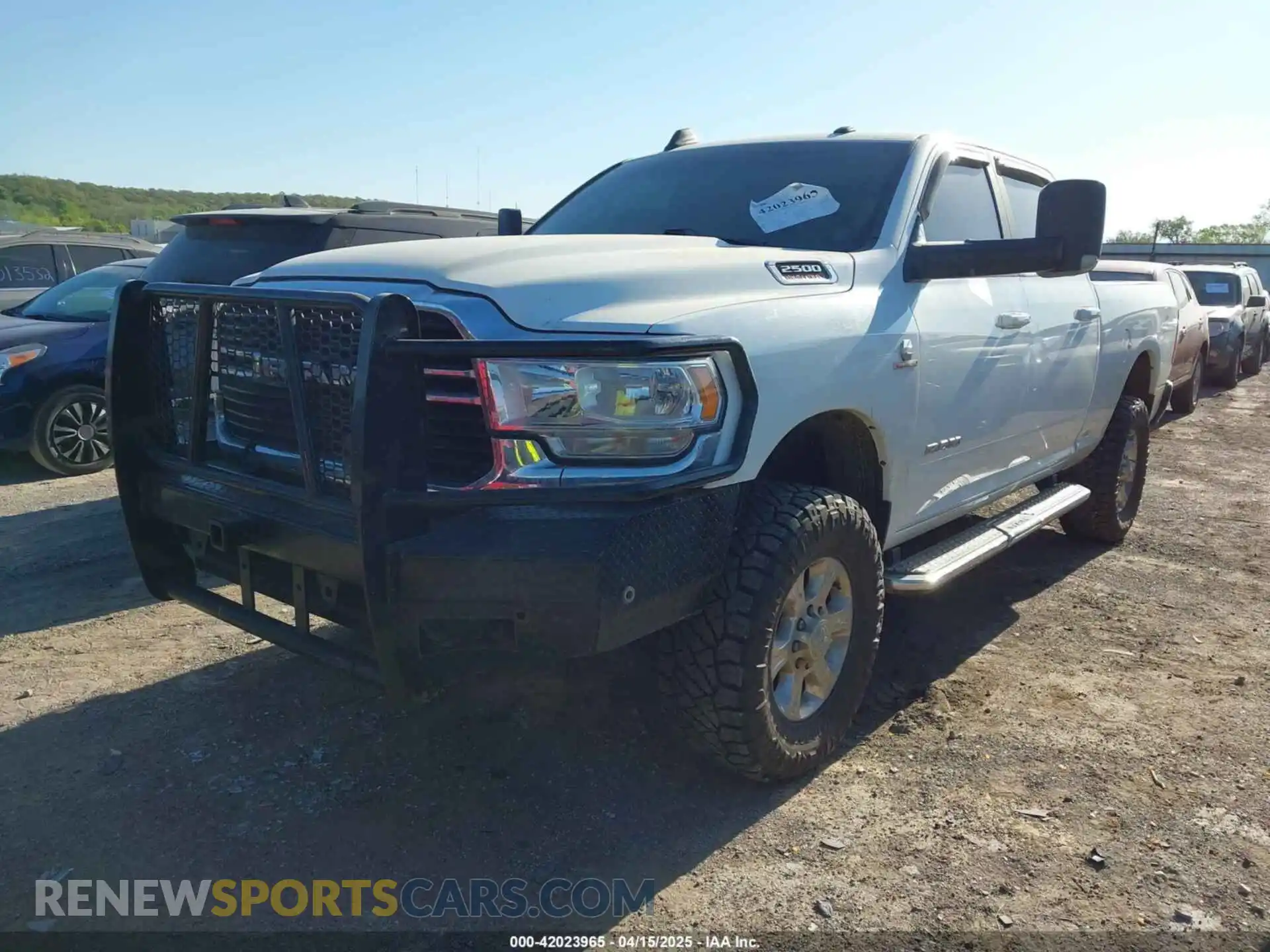 2 Photograph of a damaged car 3C6UR5DL7LG160263 RAM 2500 2020