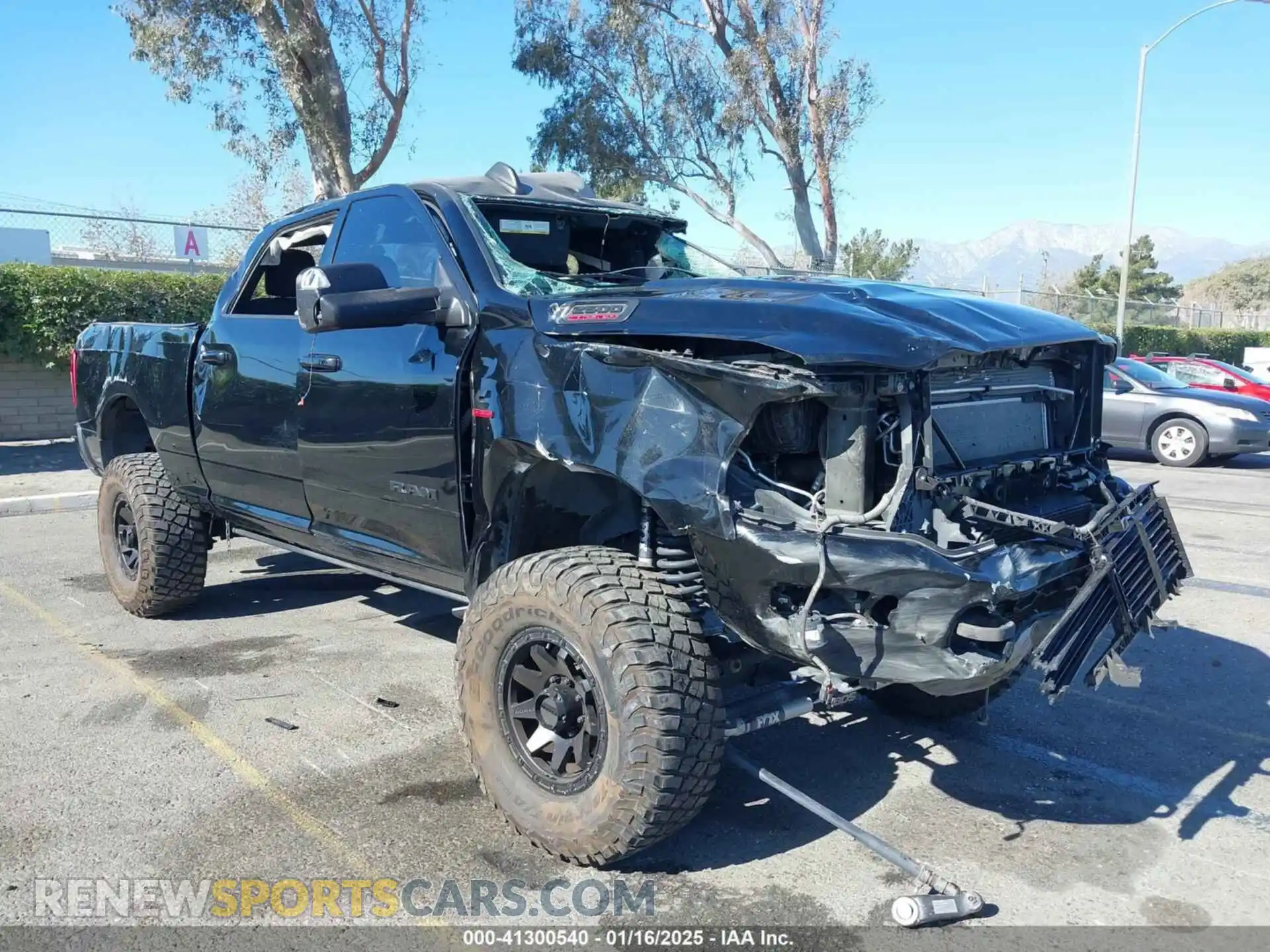 1 Photograph of a damaged car 3C6UR5DLXLG284348 RAM 2500 2020