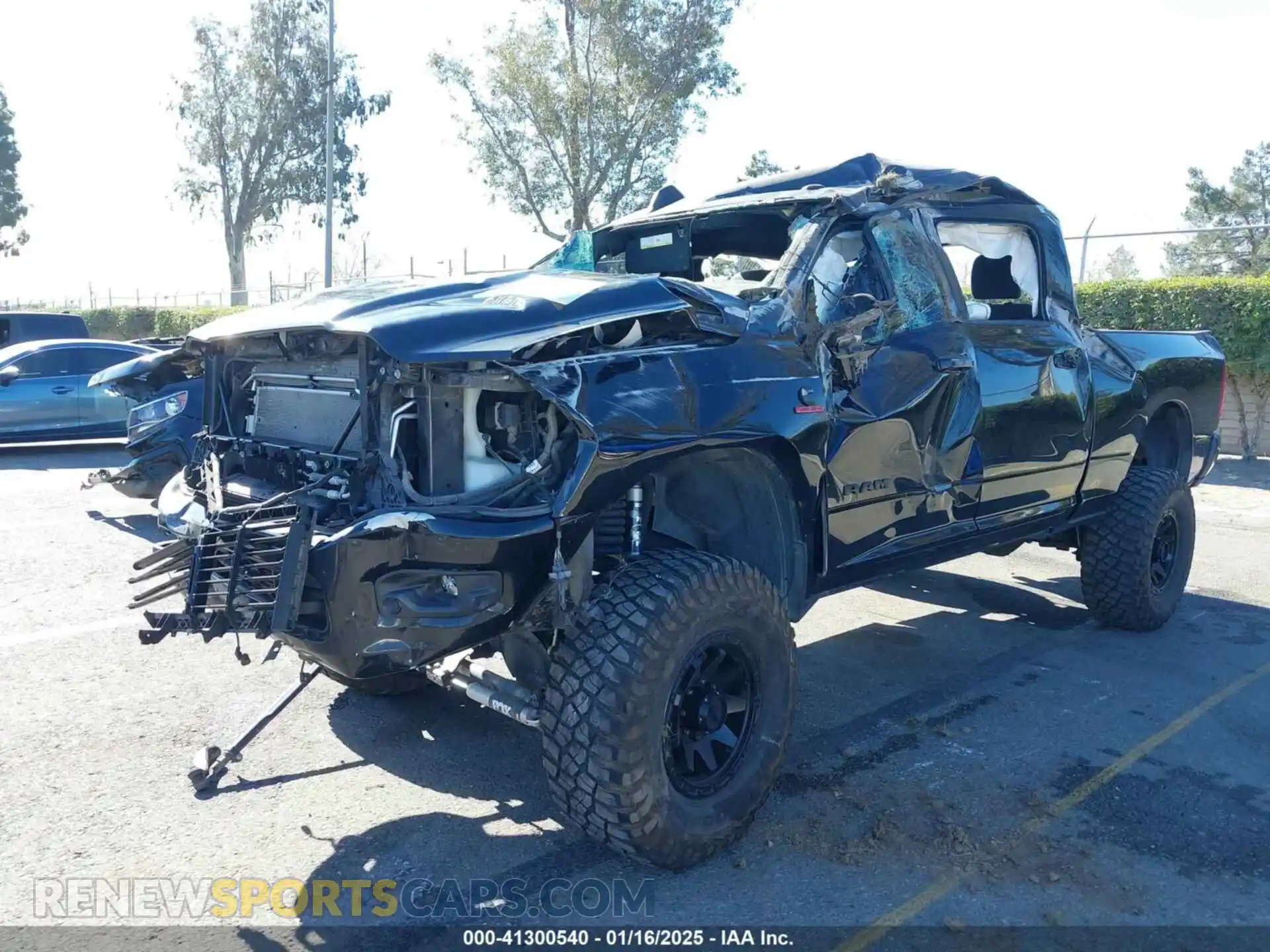 2 Photograph of a damaged car 3C6UR5DLXLG284348 RAM 2500 2020