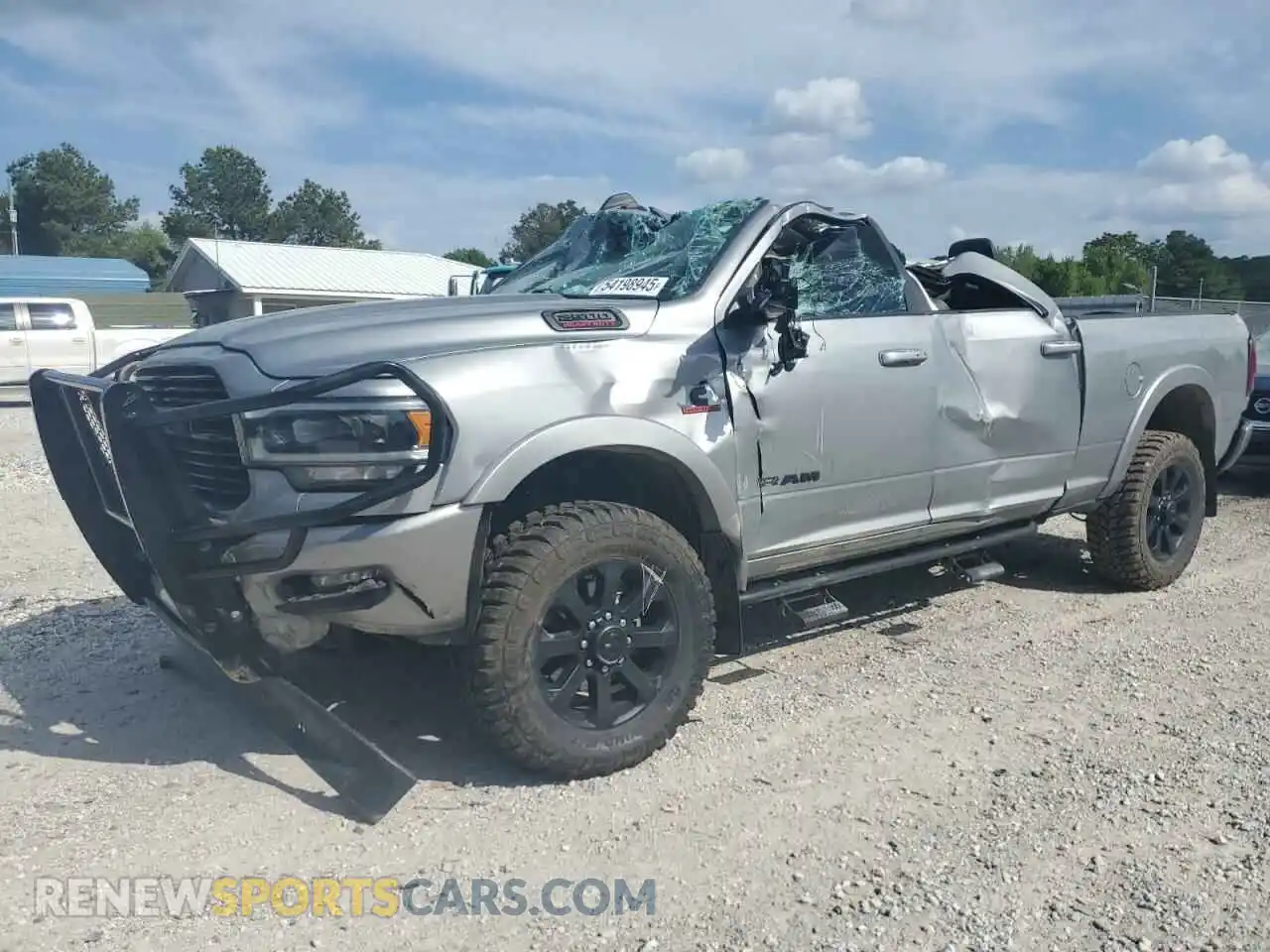 1 Photograph of a damaged car 3C6UR5FL2LG282784 RAM 2500 2020