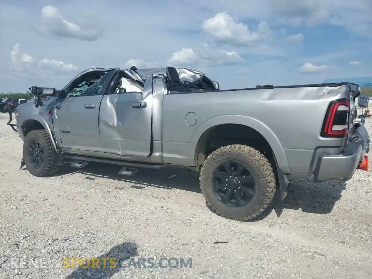 2 Photograph of a damaged car 3C6UR5FL2LG282784 RAM 2500 2020