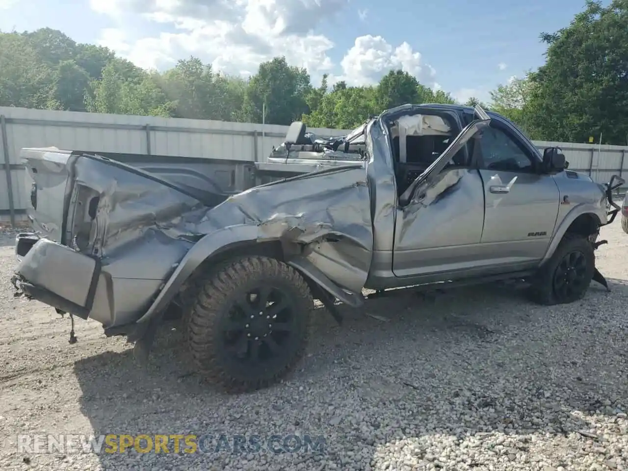 3 Photograph of a damaged car 3C6UR5FL2LG282784 RAM 2500 2020