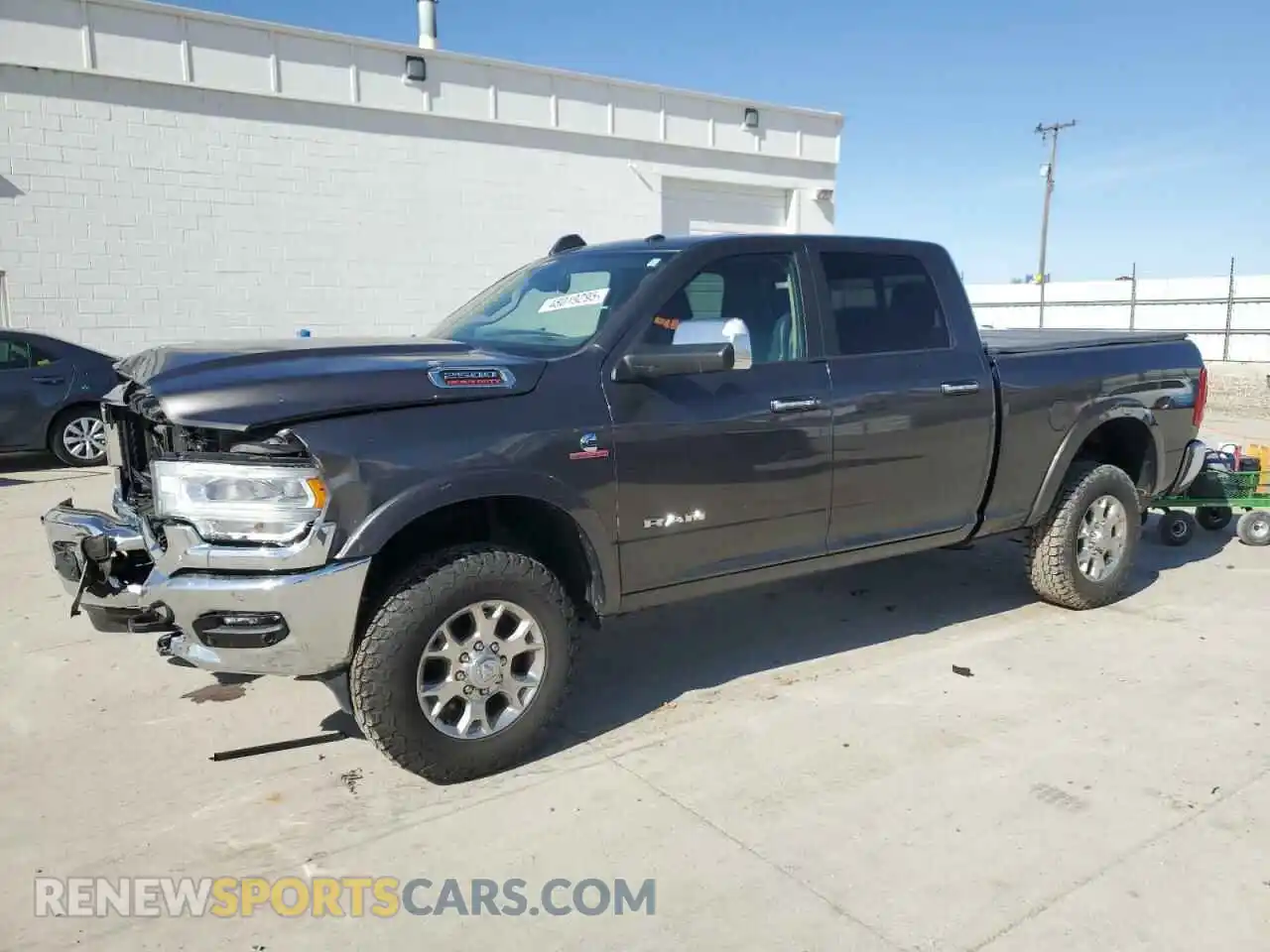 1 Photograph of a damaged car 3C6UR5FL6LG122309 RAM 2500 2020