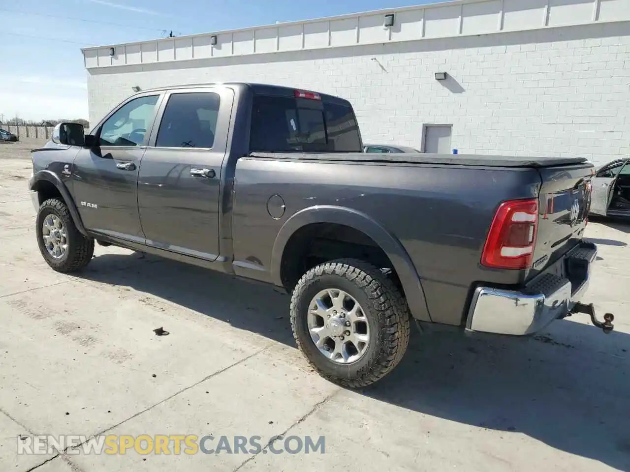 2 Photograph of a damaged car 3C6UR5FL6LG122309 RAM 2500 2020