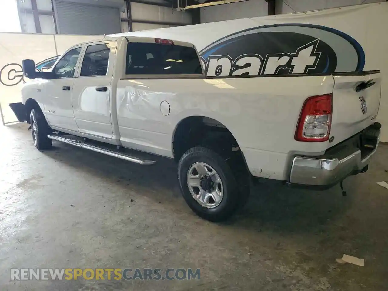2 Photograph of a damaged car 3C6UR5HJ1LG111844 RAM 2500 2020