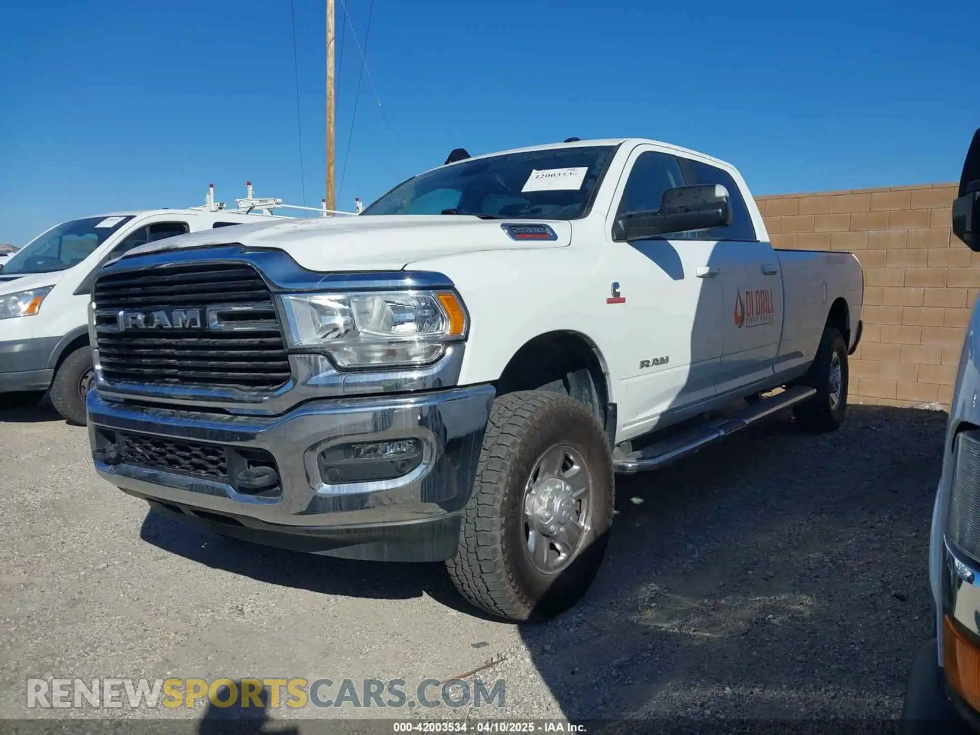 2 Photograph of a damaged car 3C6UR5JL7LG159814 RAM 2500 2020