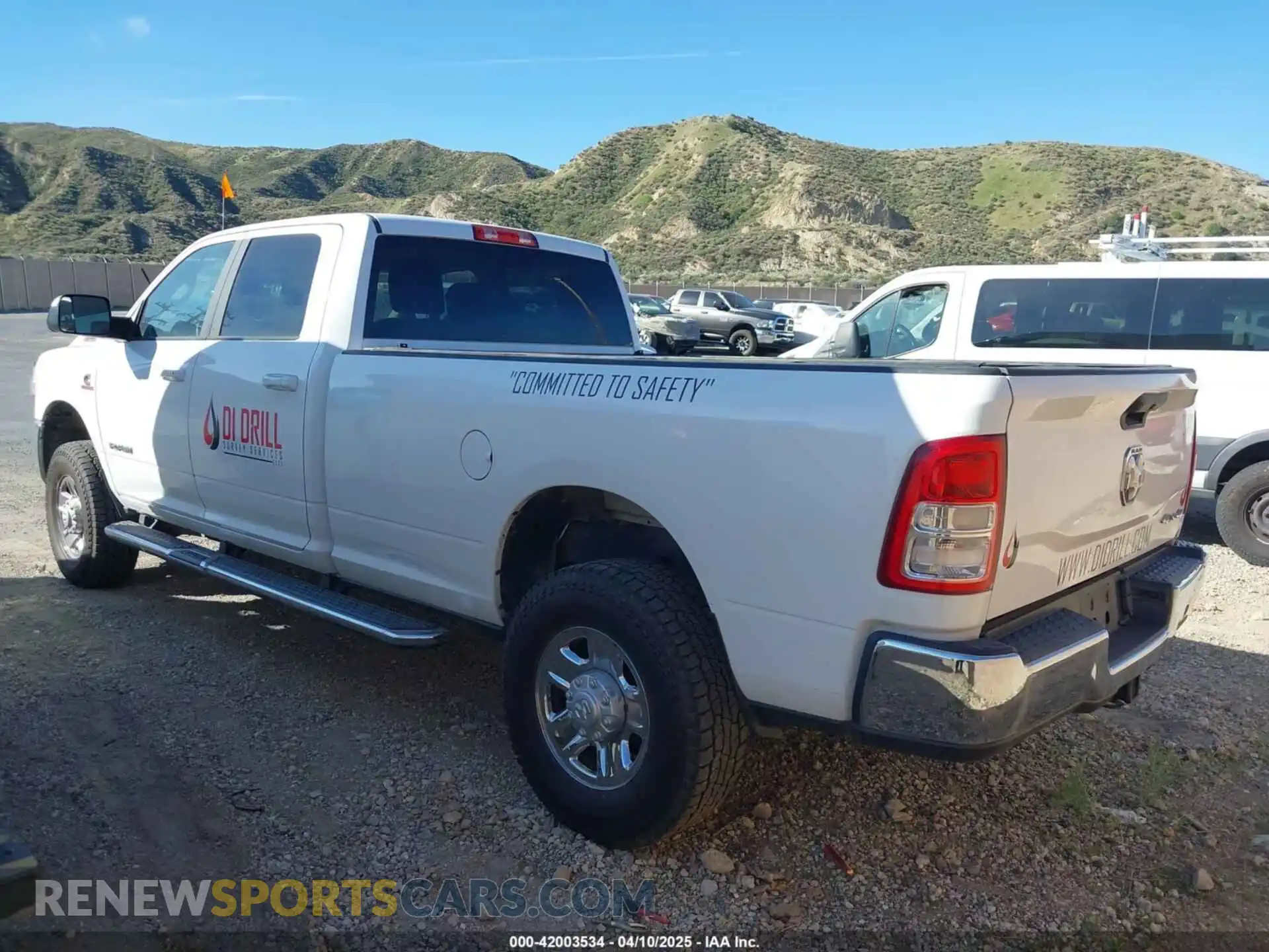 3 Photograph of a damaged car 3C6UR5JL7LG159814 RAM 2500 2020