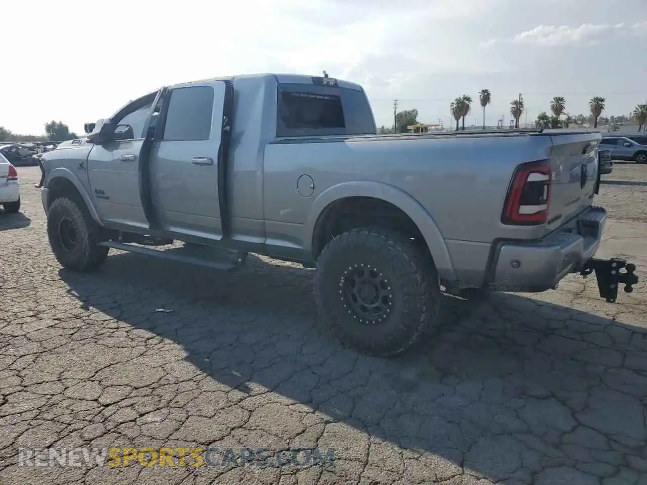 2 Photograph of a damaged car 3C6UR5NL8LG274089 RAM 2500 2020