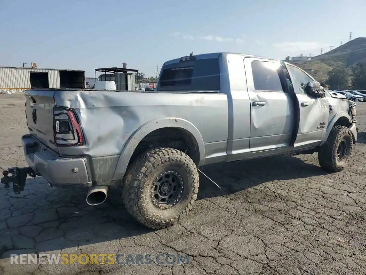 3 Photograph of a damaged car 3C6UR5NL8LG274089 RAM 2500 2020