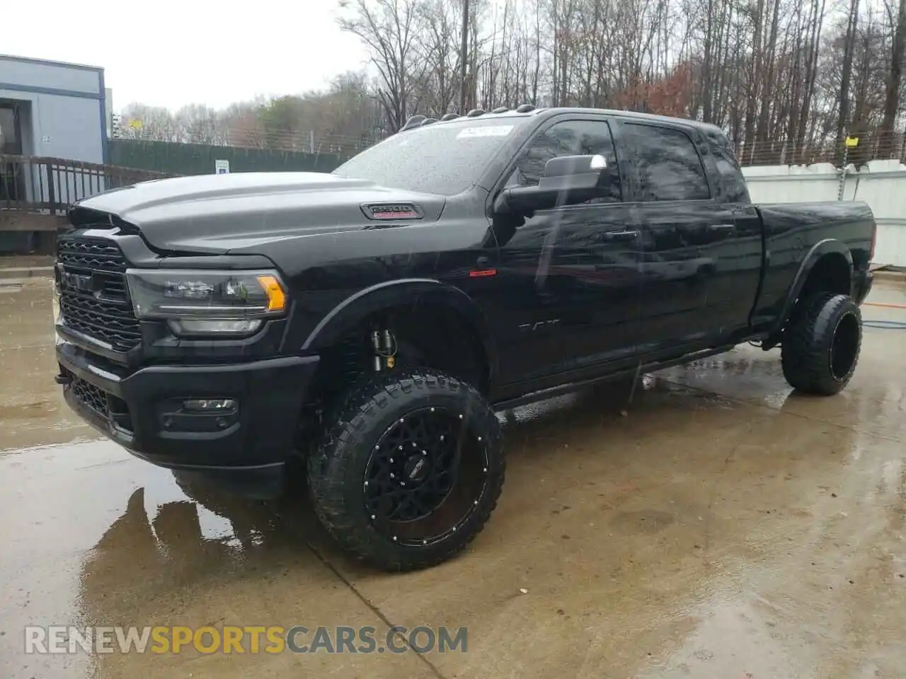 1 Photograph of a damaged car 3C6UR5TL1LG201617 RAM 2500 2020