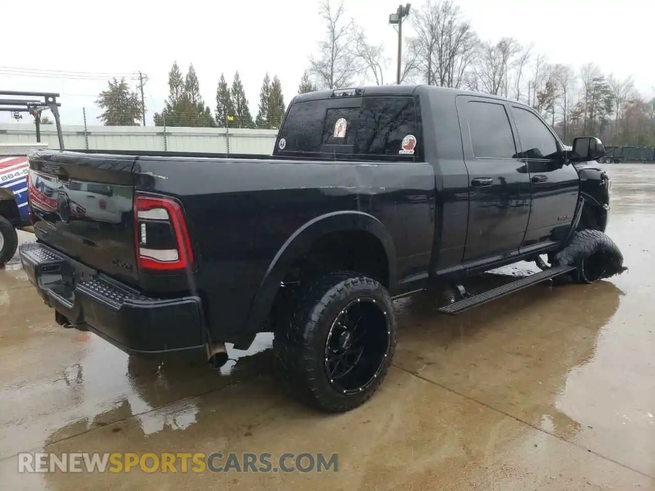 3 Photograph of a damaged car 3C6UR5TL1LG201617 RAM 2500 2020
