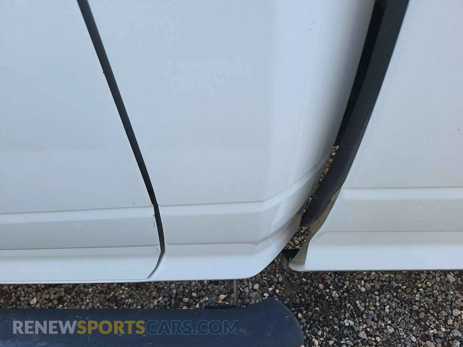 1 Photograph of a damaged car 3C6MR5AJ8MG611026 RAM 2500 2021