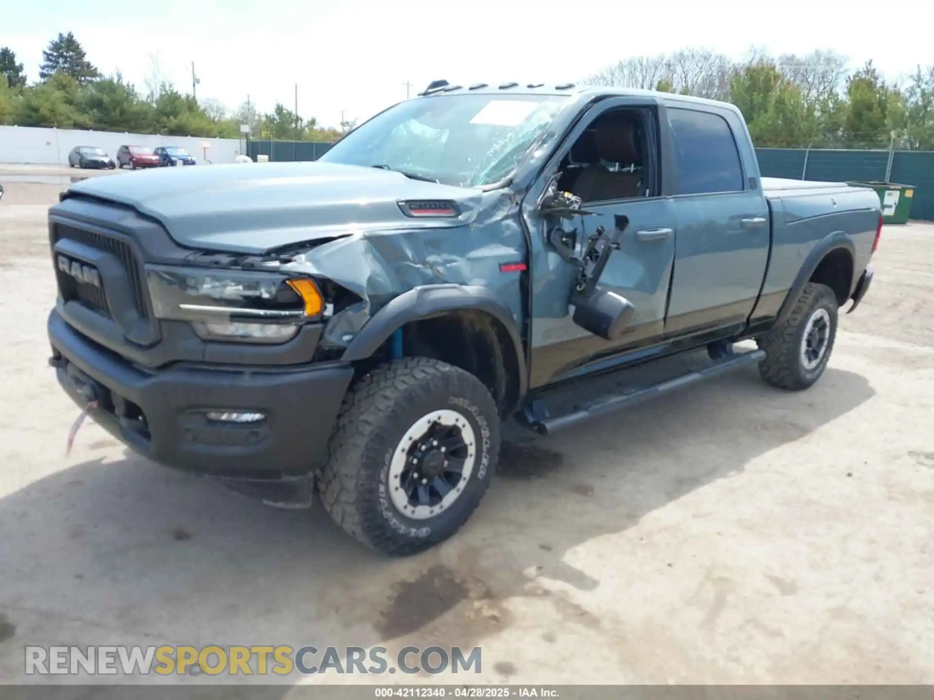 2 Photograph of a damaged car 3C6TR5EJ0MG575323 RAM 2500 2021
